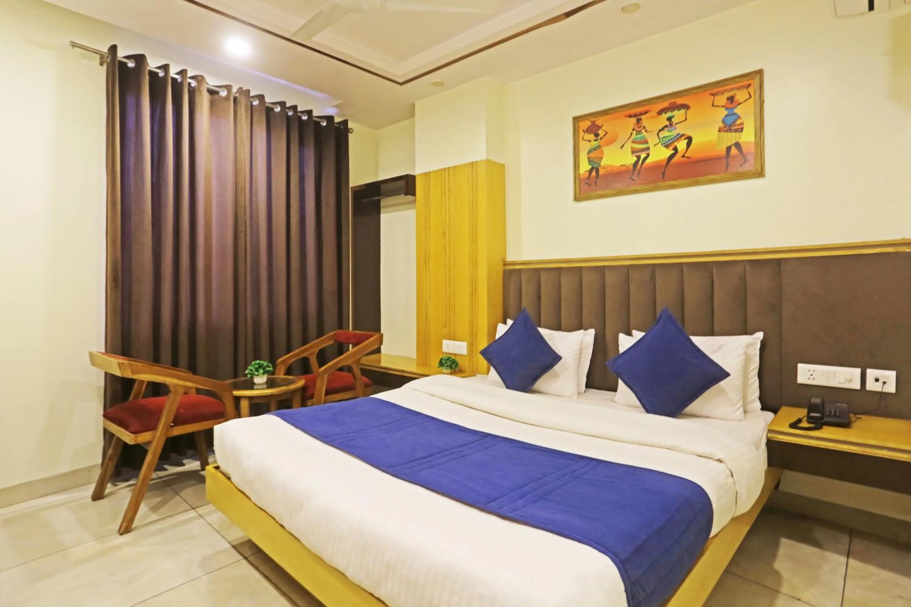 Photo of the whole room, Bed in Hotel Aman Imperial Just a Minute Away From New Delhi Railway Station and Connaught place