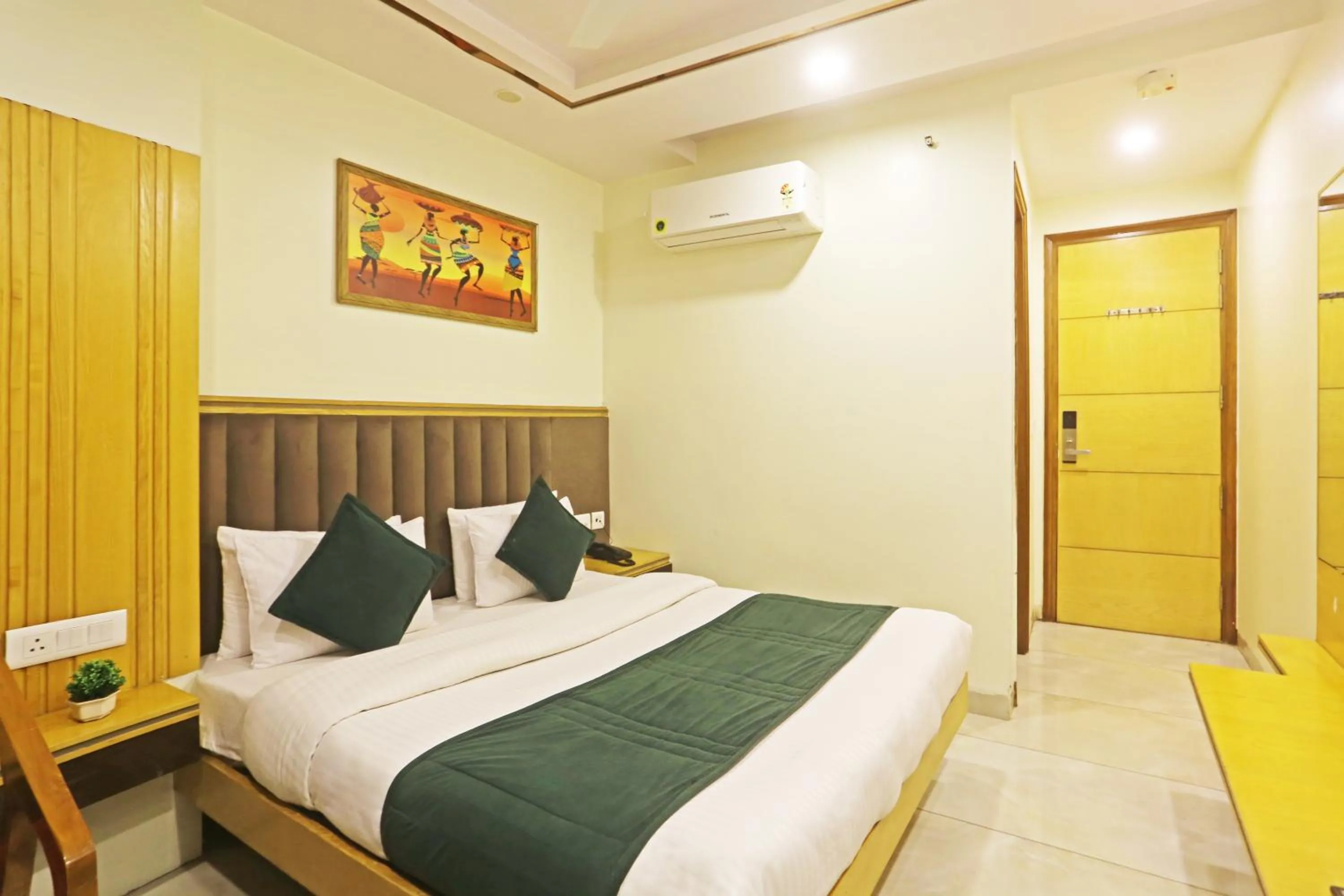 Photo of the whole room, Bed in Hotel Aman Imperial Just a Minute Away From New Delhi Railway Station and Connaught place