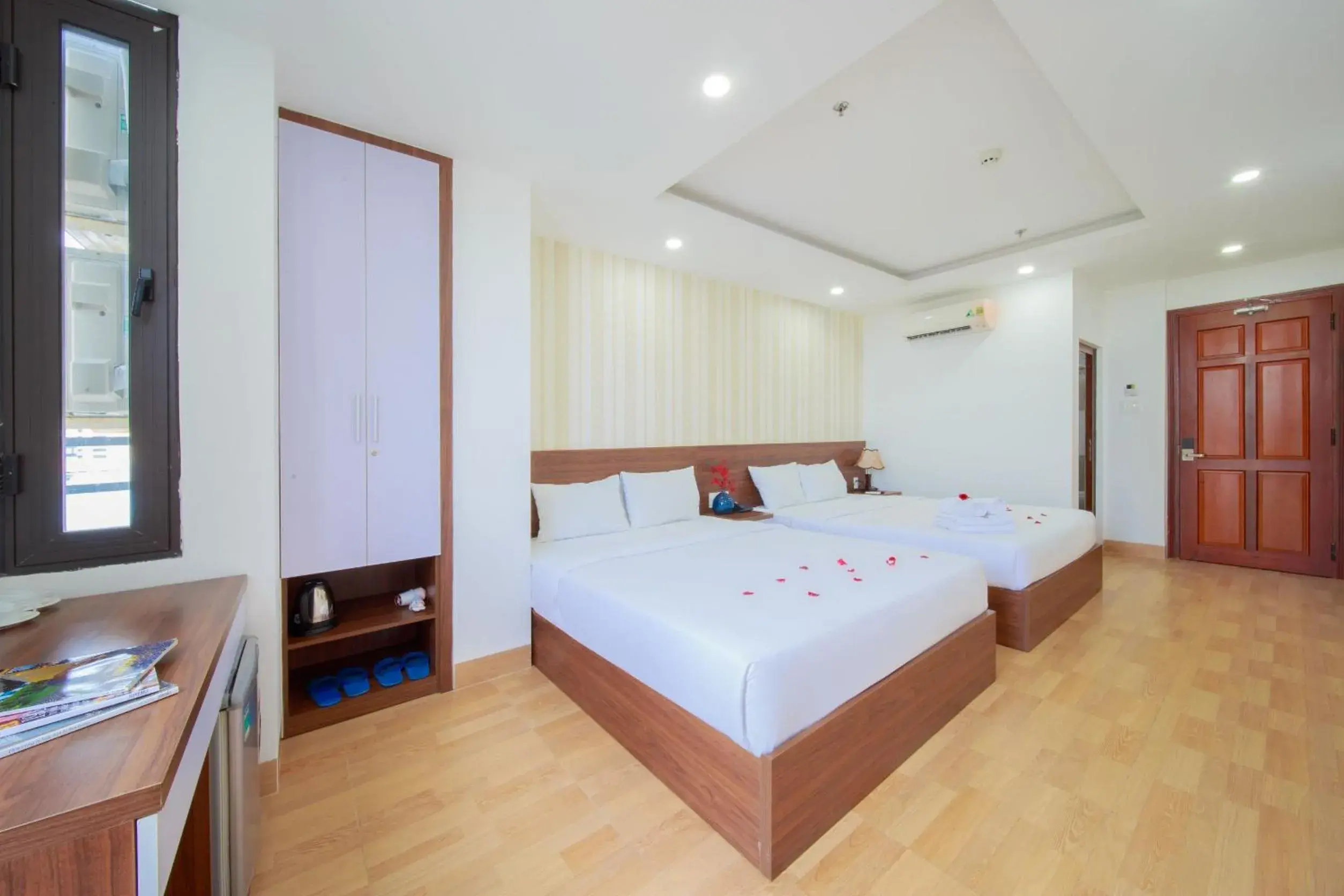 Deluxe Family Room in Ha Nhung Hotel Nha Trang Deluxe Family Room in Ha Nhung Hotel Nha Trang