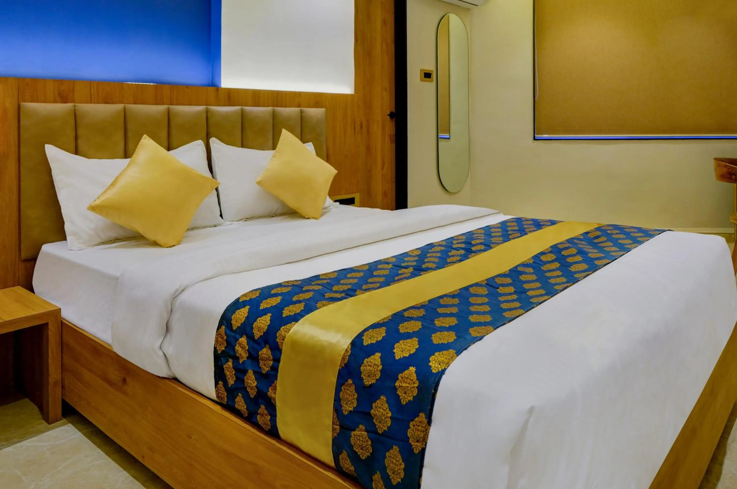 Bed in Metropolis Business Hotel