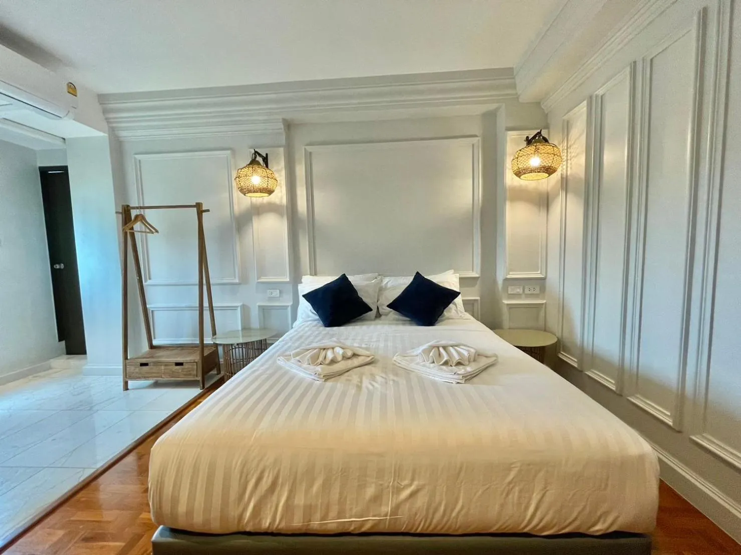 Bed in Wiang Ville Boutique Hotel