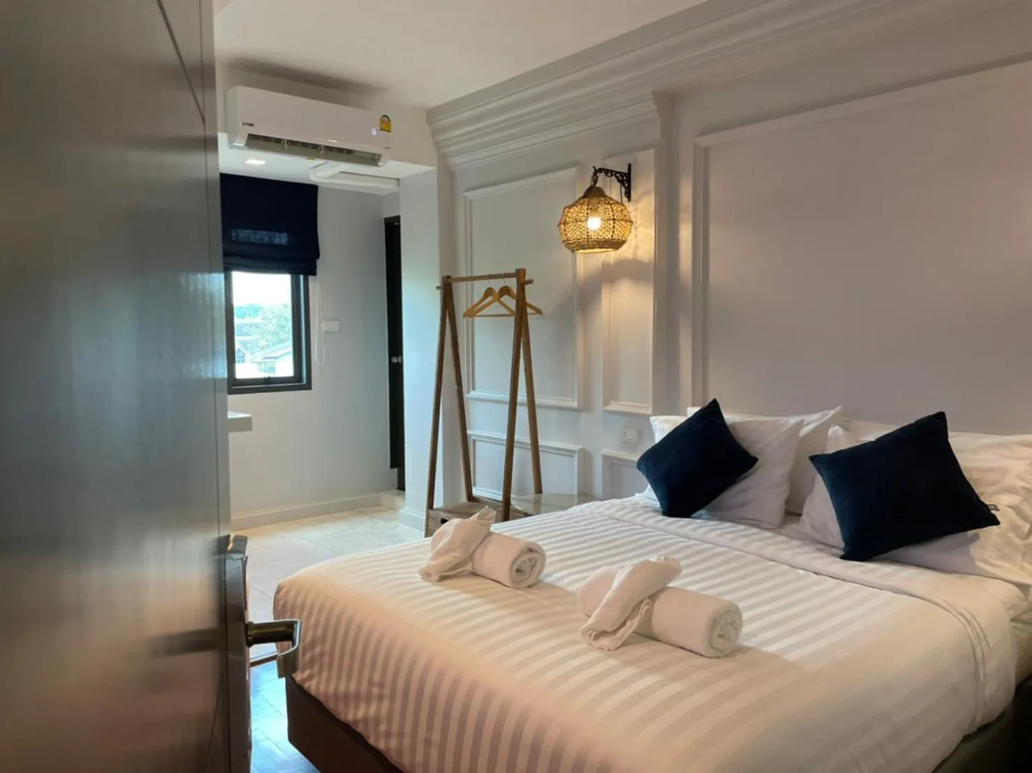 Bedroom in Wiang Ville Boutique Hotel