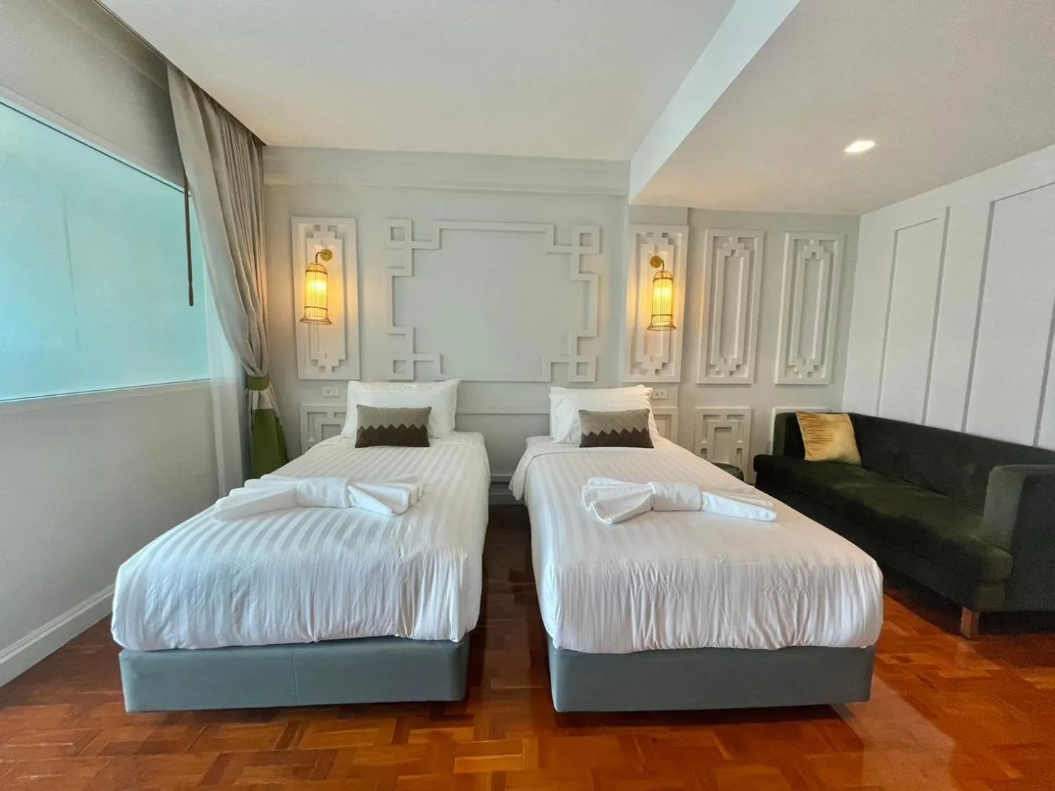 Bed in Wiang Ville Boutique Hotel