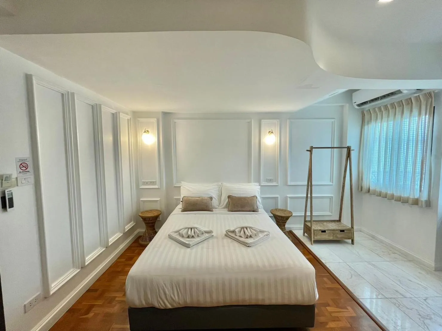 Bed in Wiang Ville Boutique Hotel