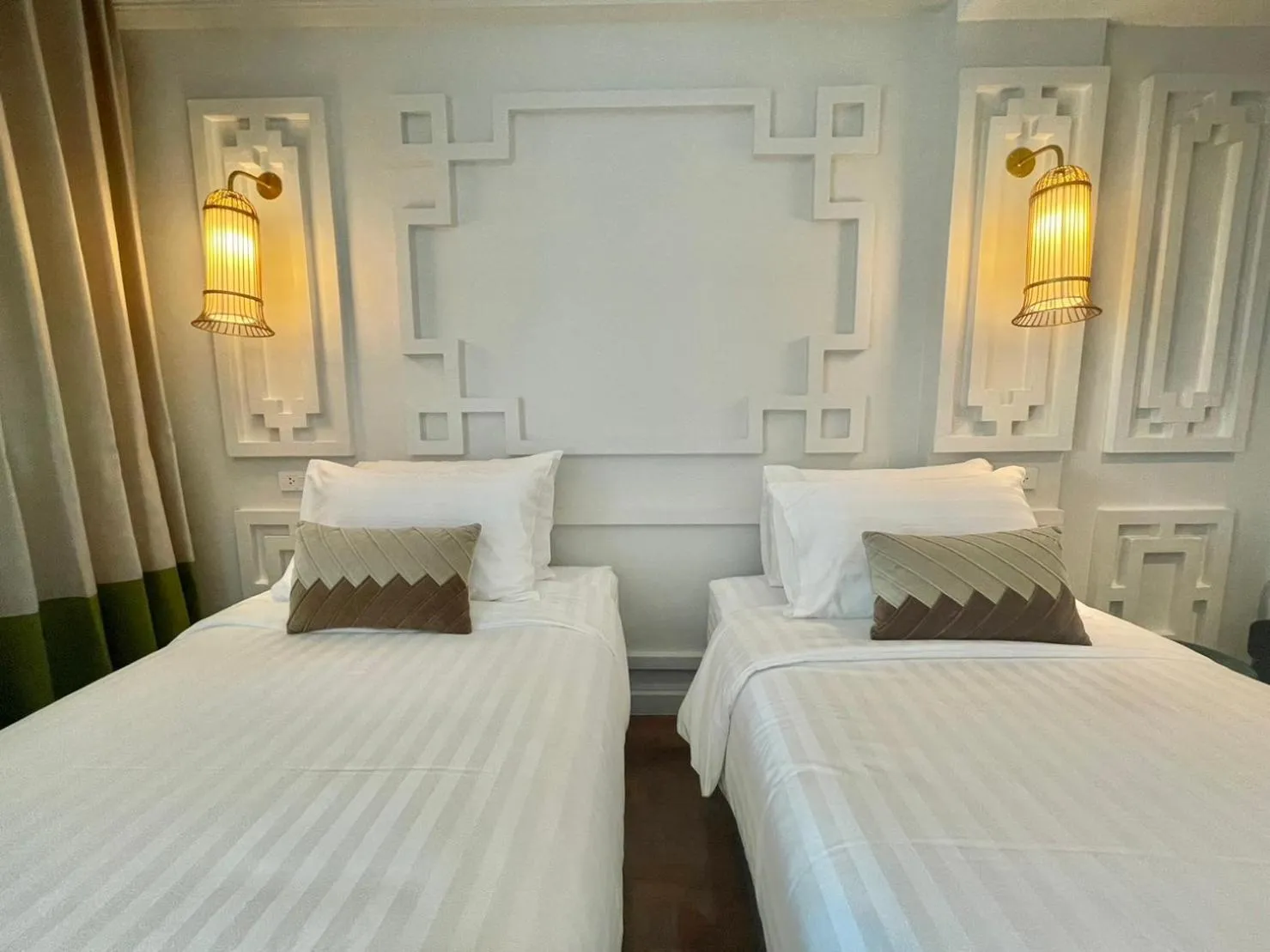 Bed in Wiang Ville Boutique Hotel