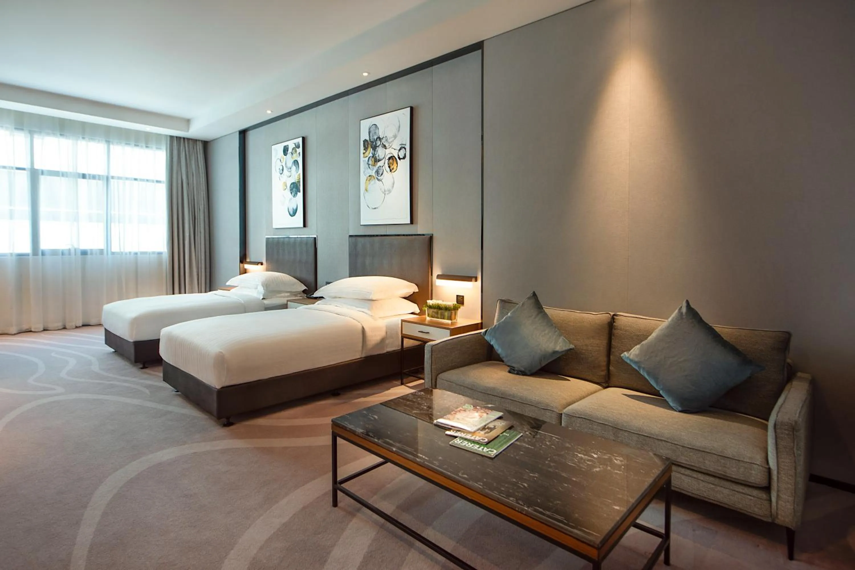 Bed in Asiana Grand Hotel