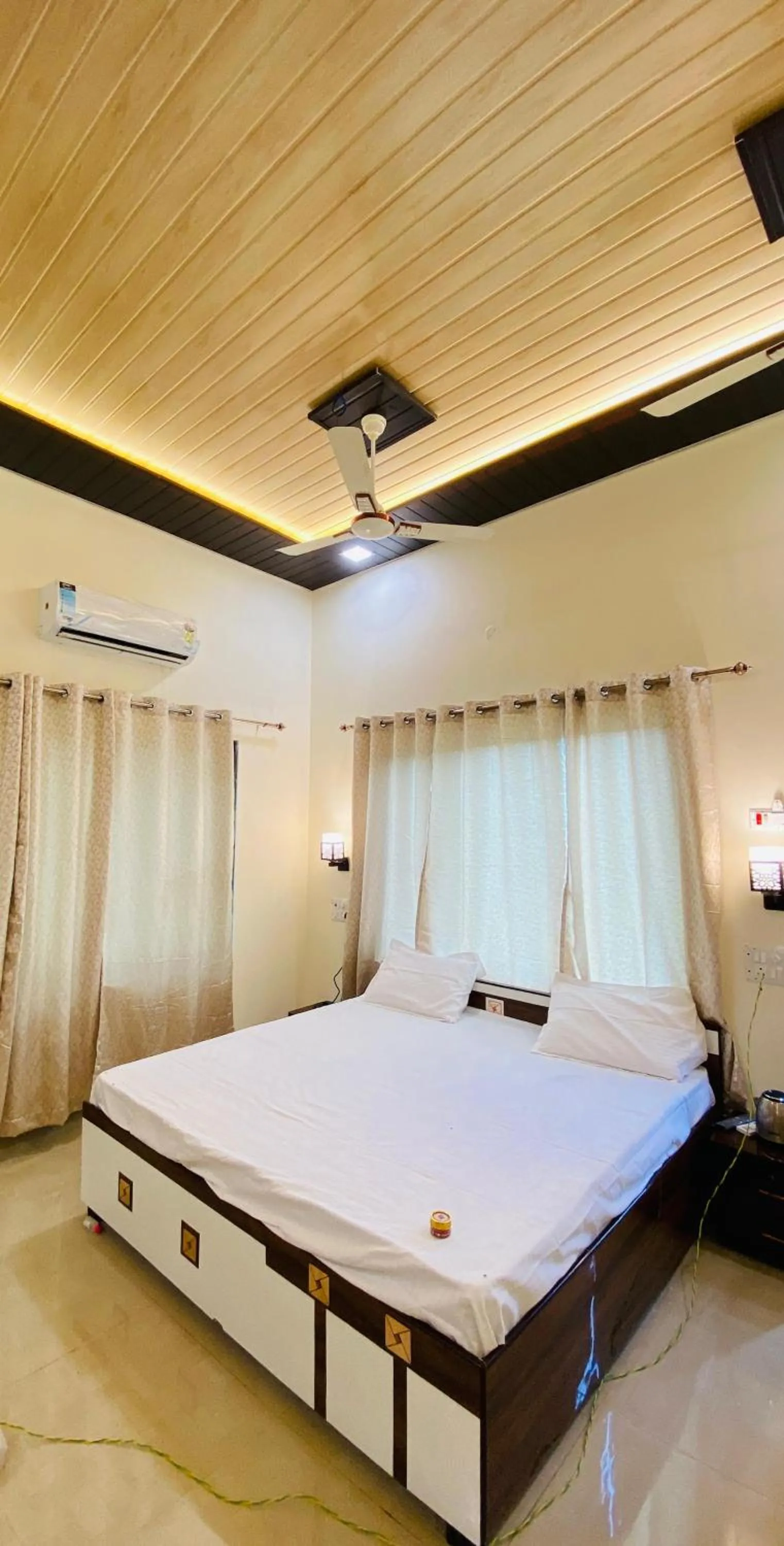 Bed in Ashoka Lawns and Resort