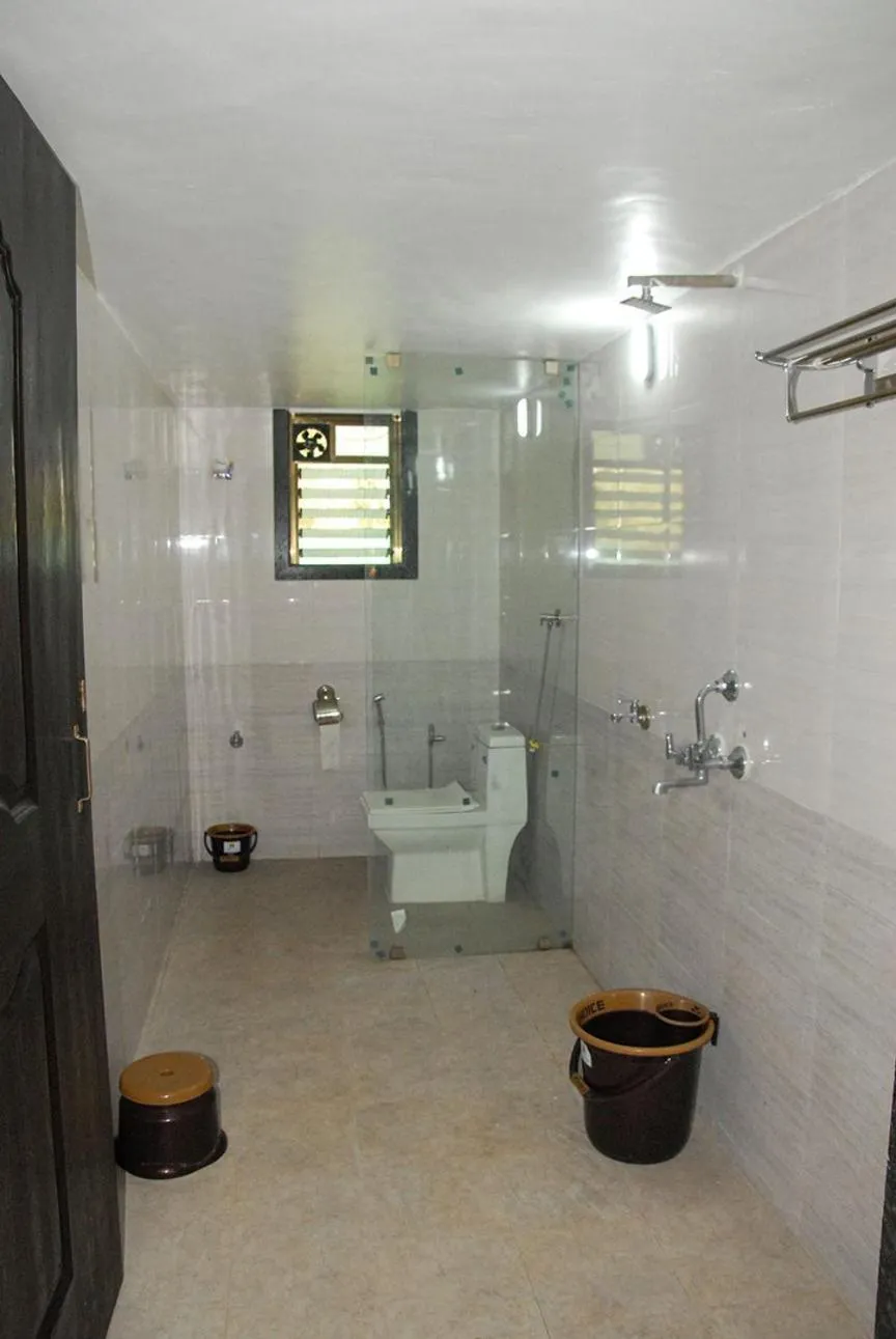 Shower in Ashoka Lawns and Resort
