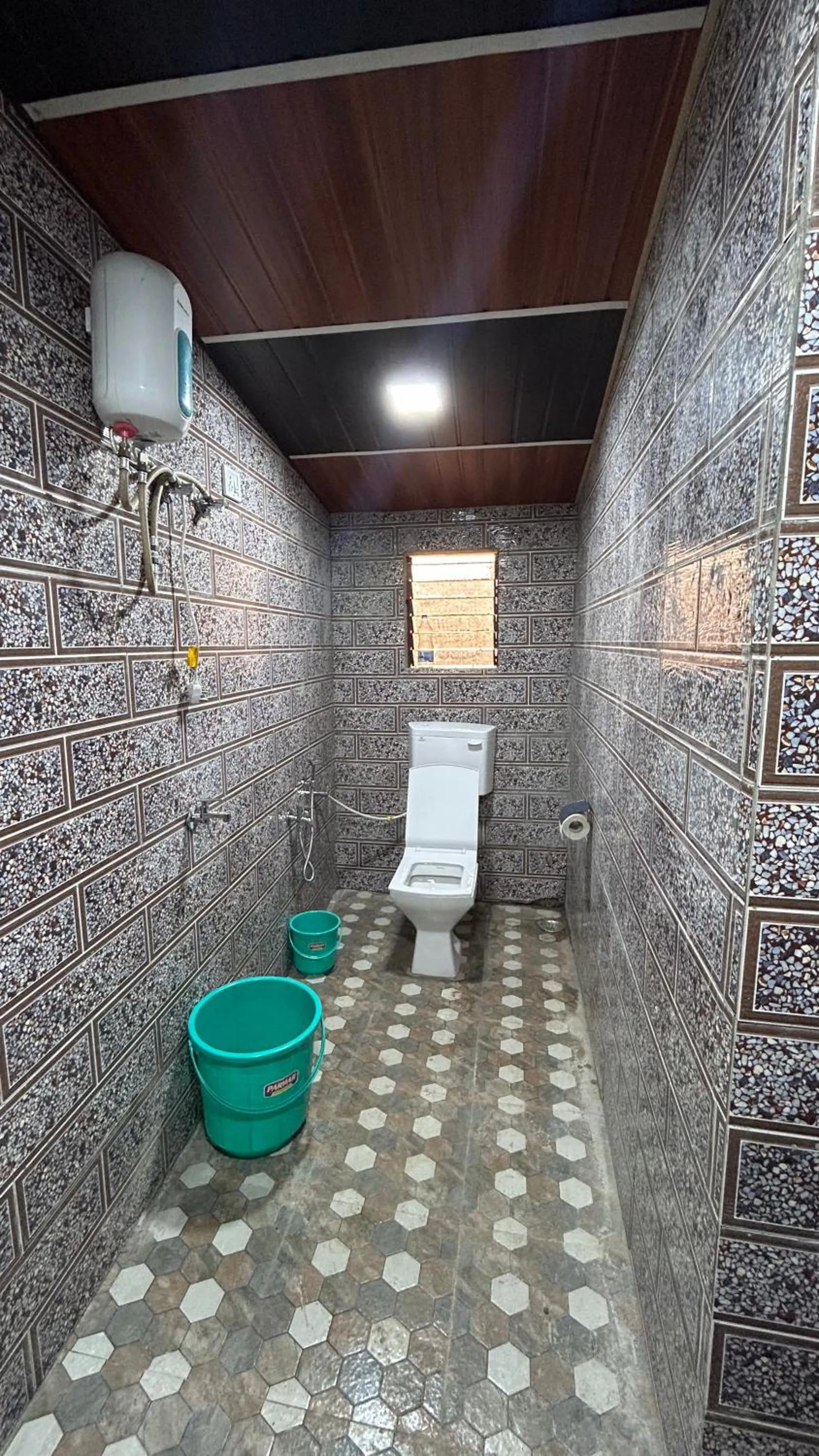 Bathroom in Ashoka Lawns and Resort