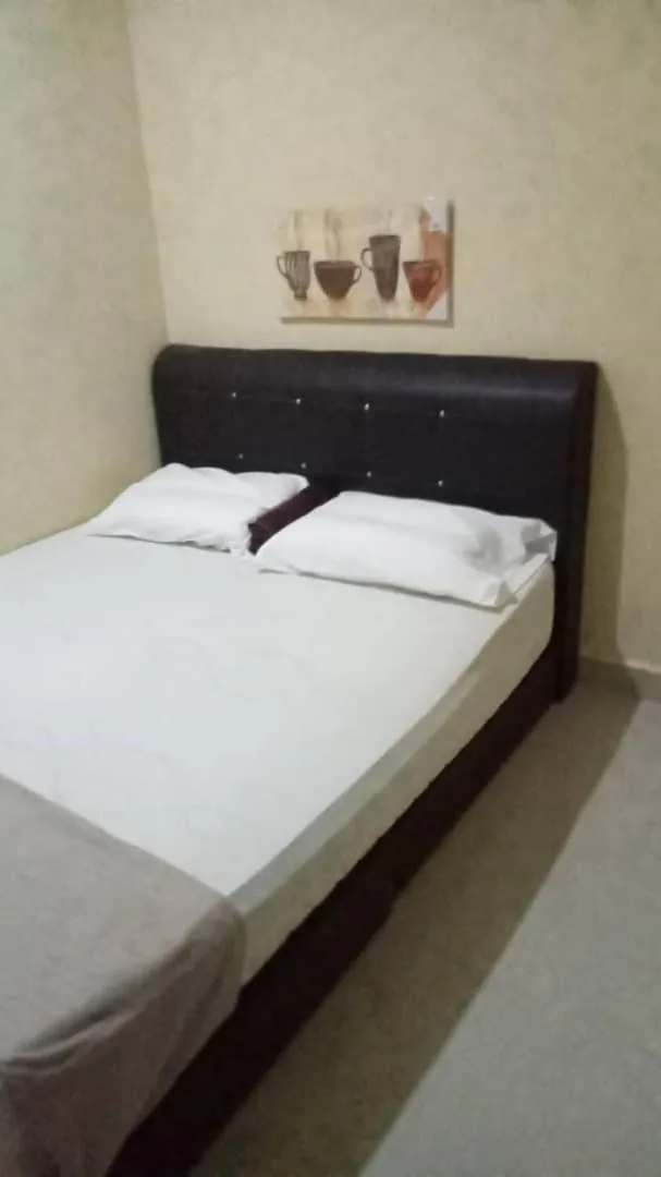 Bed in RAS Hotel