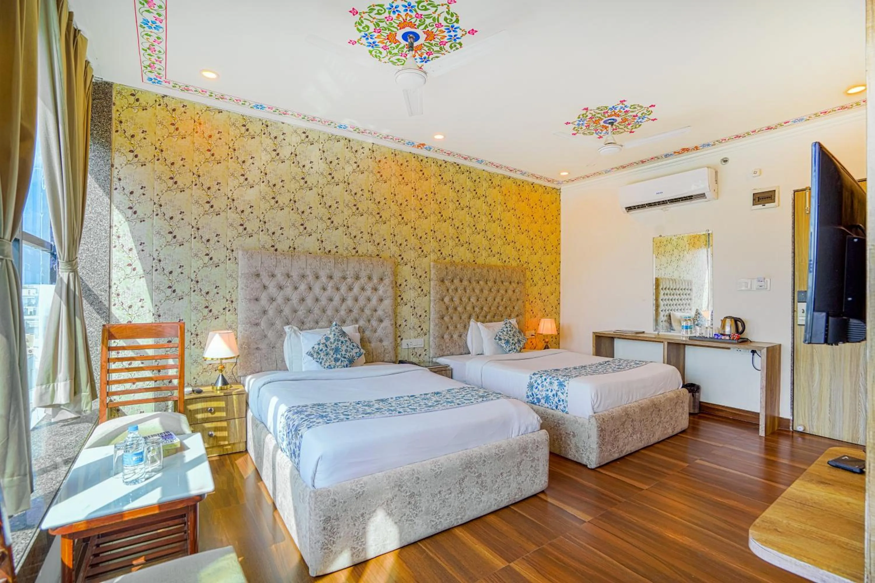 Bedroom, Bed in Pax Hotel Grand Blue 3 min walk from Udaipur city Railway Station