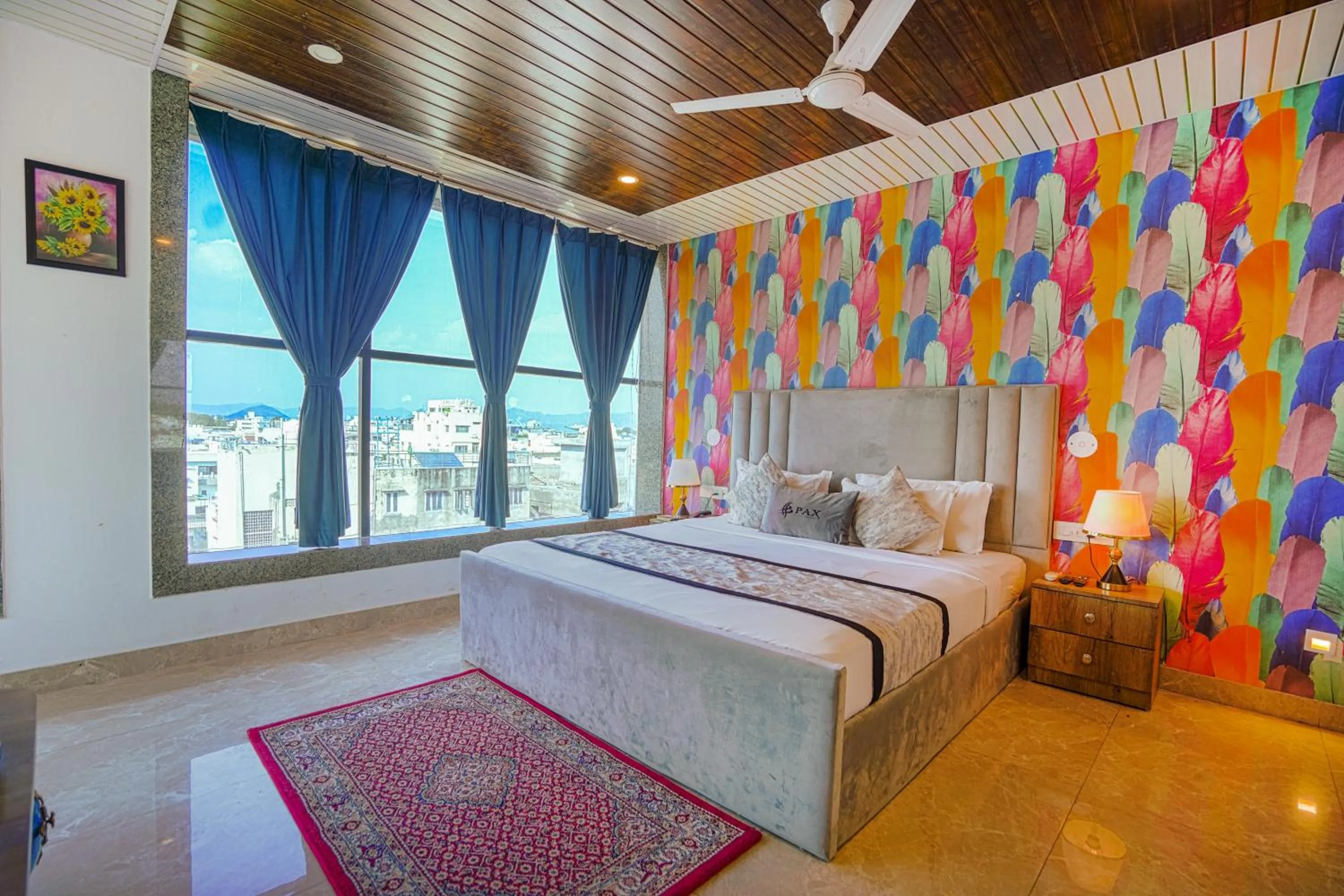 Bedroom, Bed in Pax Hotel Grand Blue 3 min walk from Udaipur city Railway Station