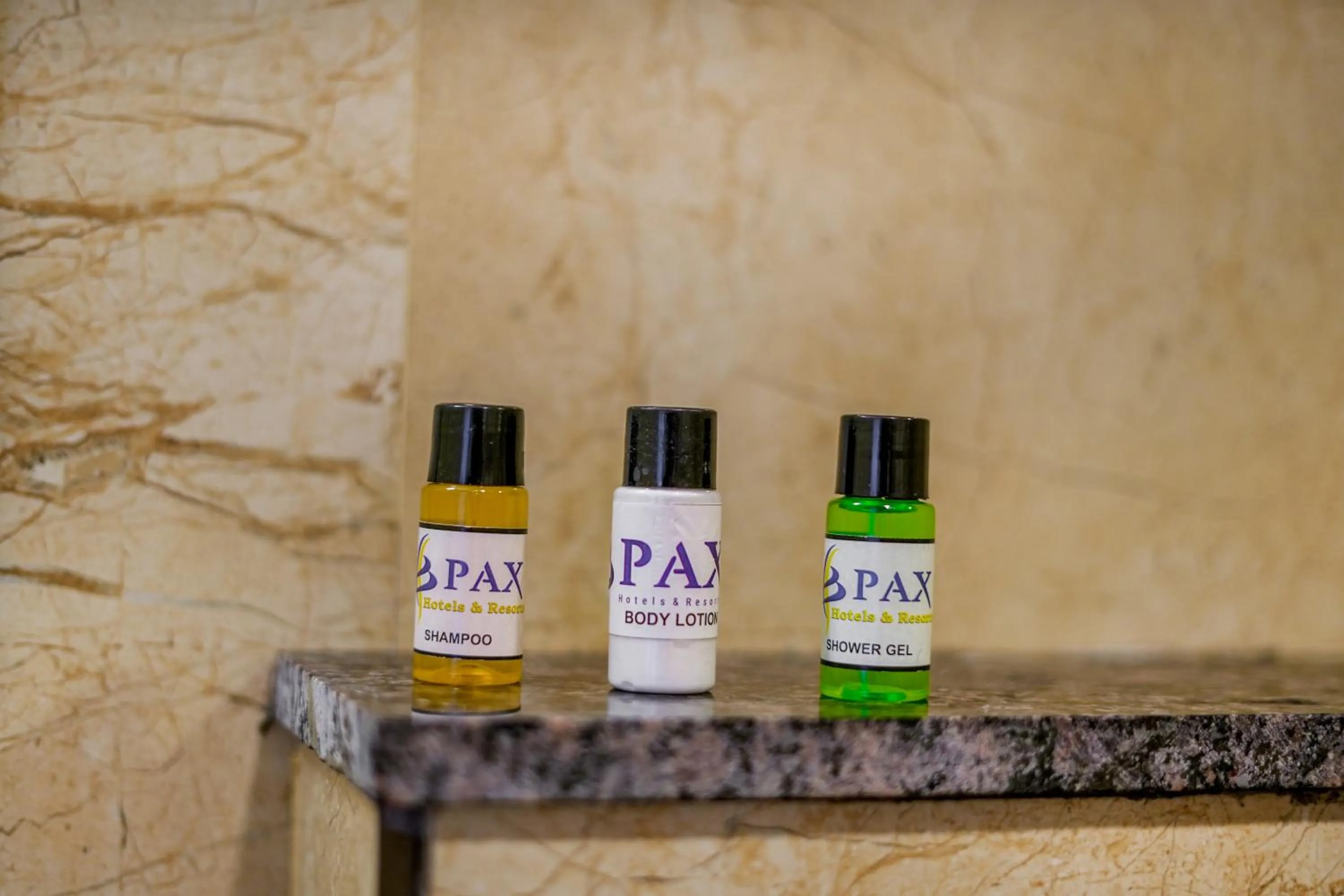 Bathroom in Pax Hotel Grand Blue 3 min walk from Udaipur city Railway Station