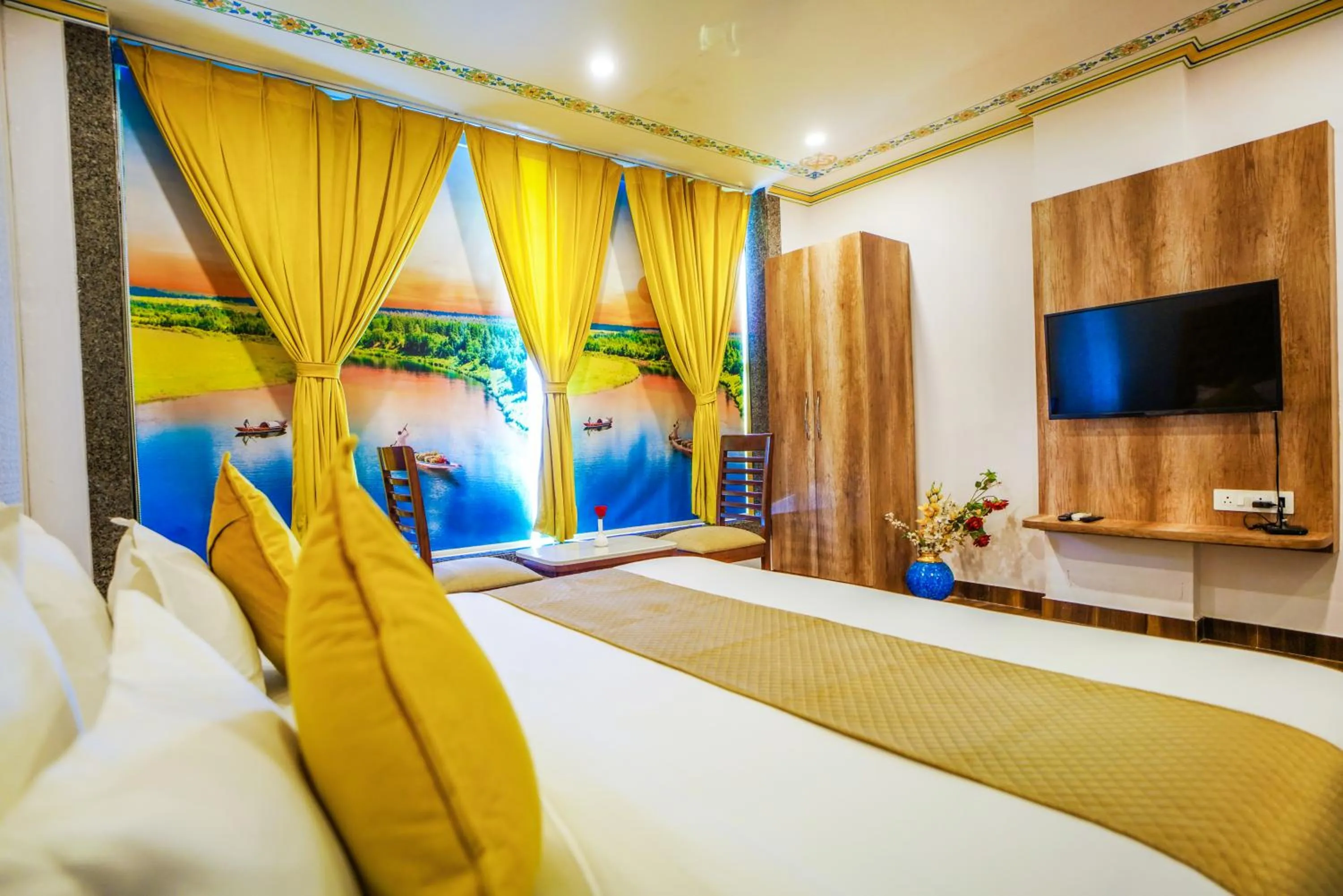 Bedroom, Bed in Pax Hotel Grand Blue 3 min walk from Udaipur city Railway Station