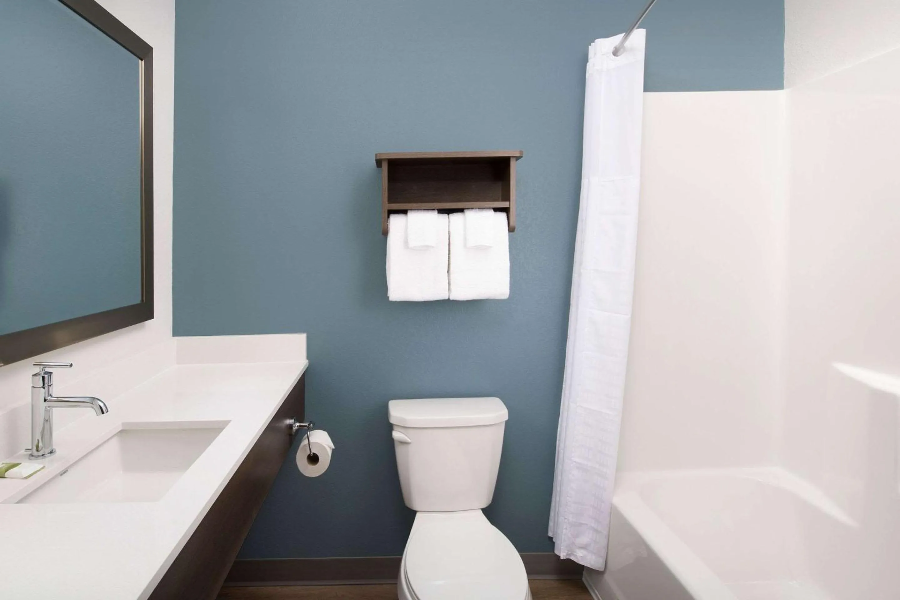 Bathroom in WoodSpring Suites Chicago Tinley Park