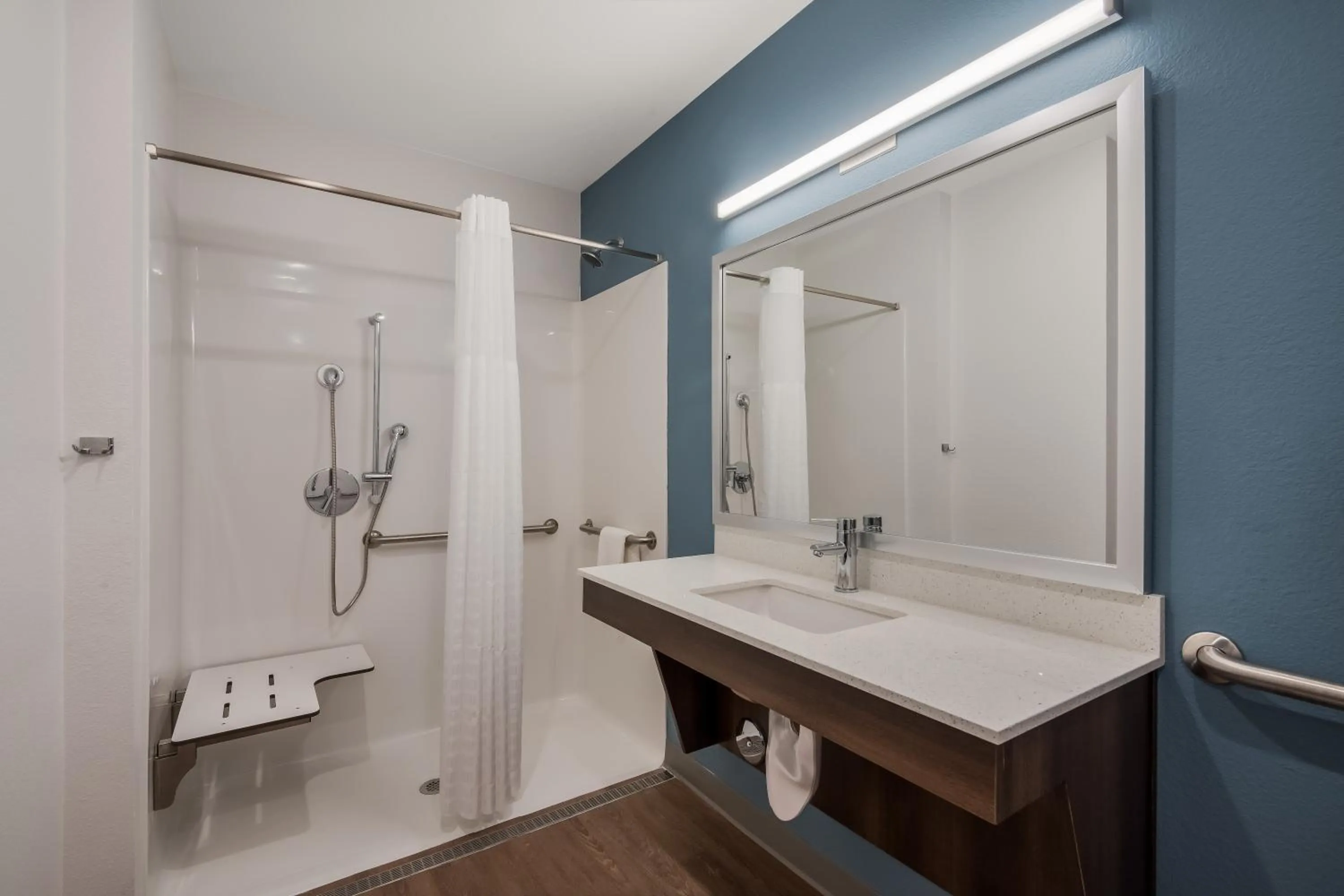 Shower in WoodSpring Suites Bellflower - Los Angeles