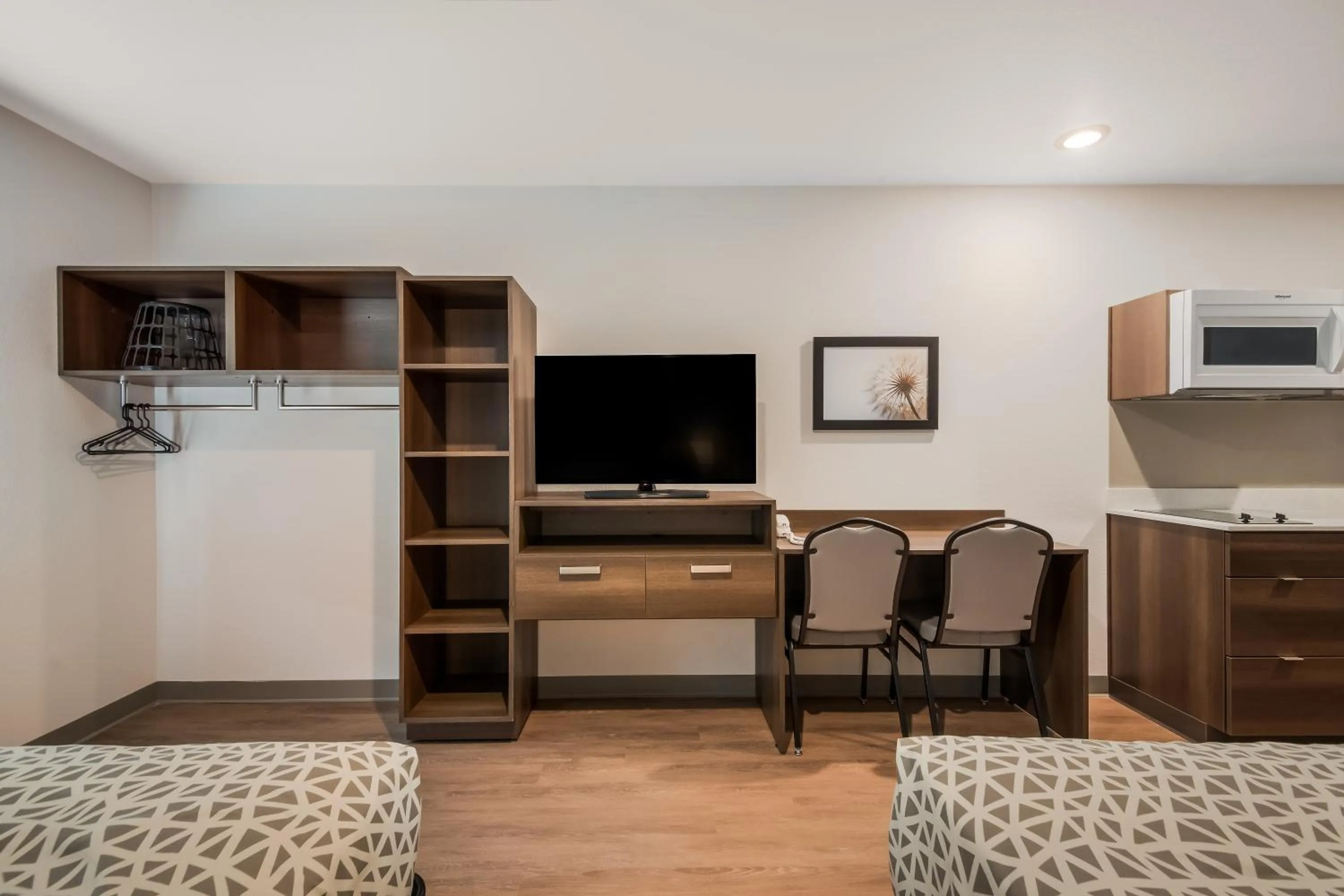 Bed in WoodSpring Suites Bellflower - Los Angeles