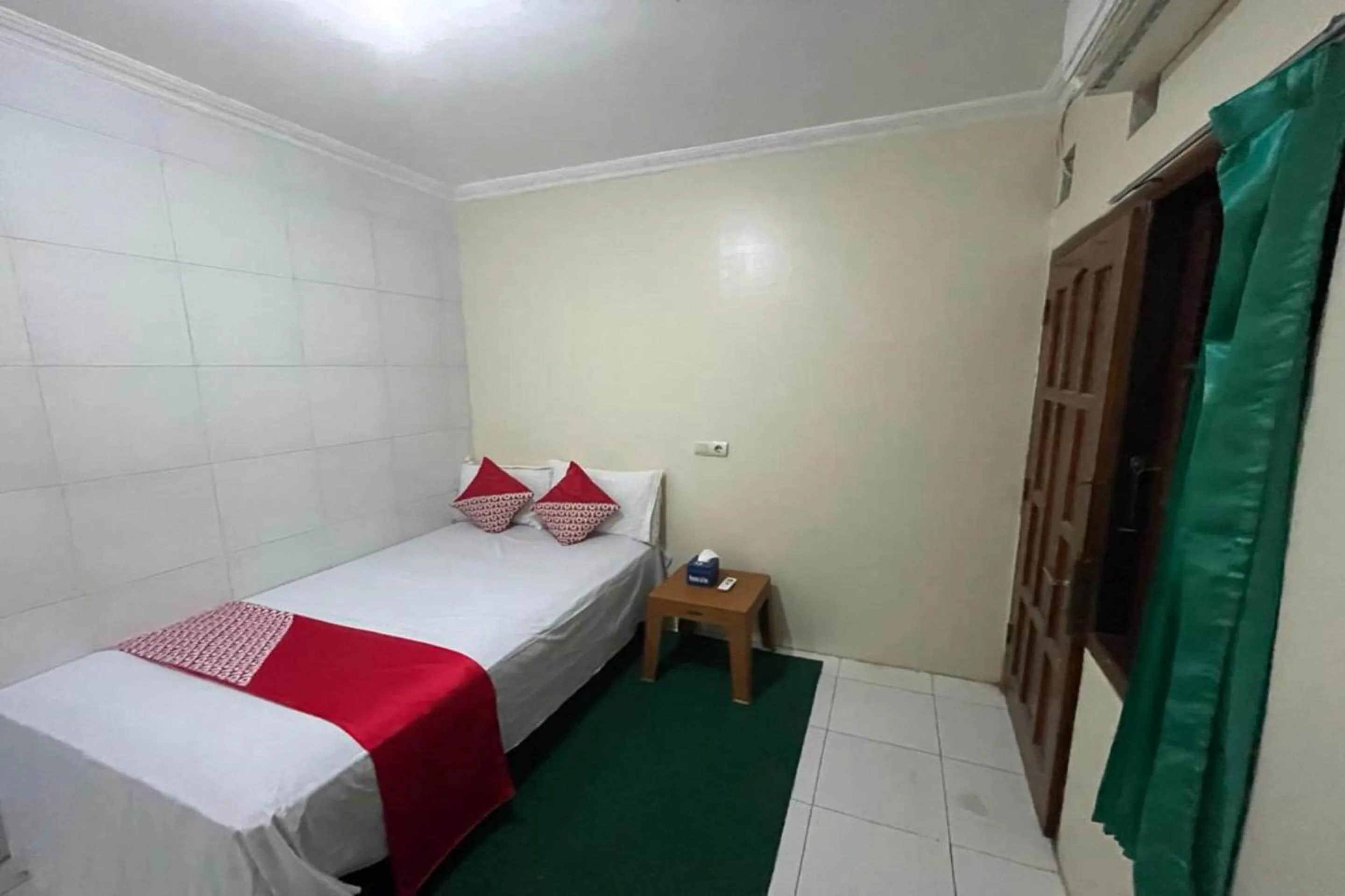 Bedroom in OYO 91920 Pondok'ku Inn