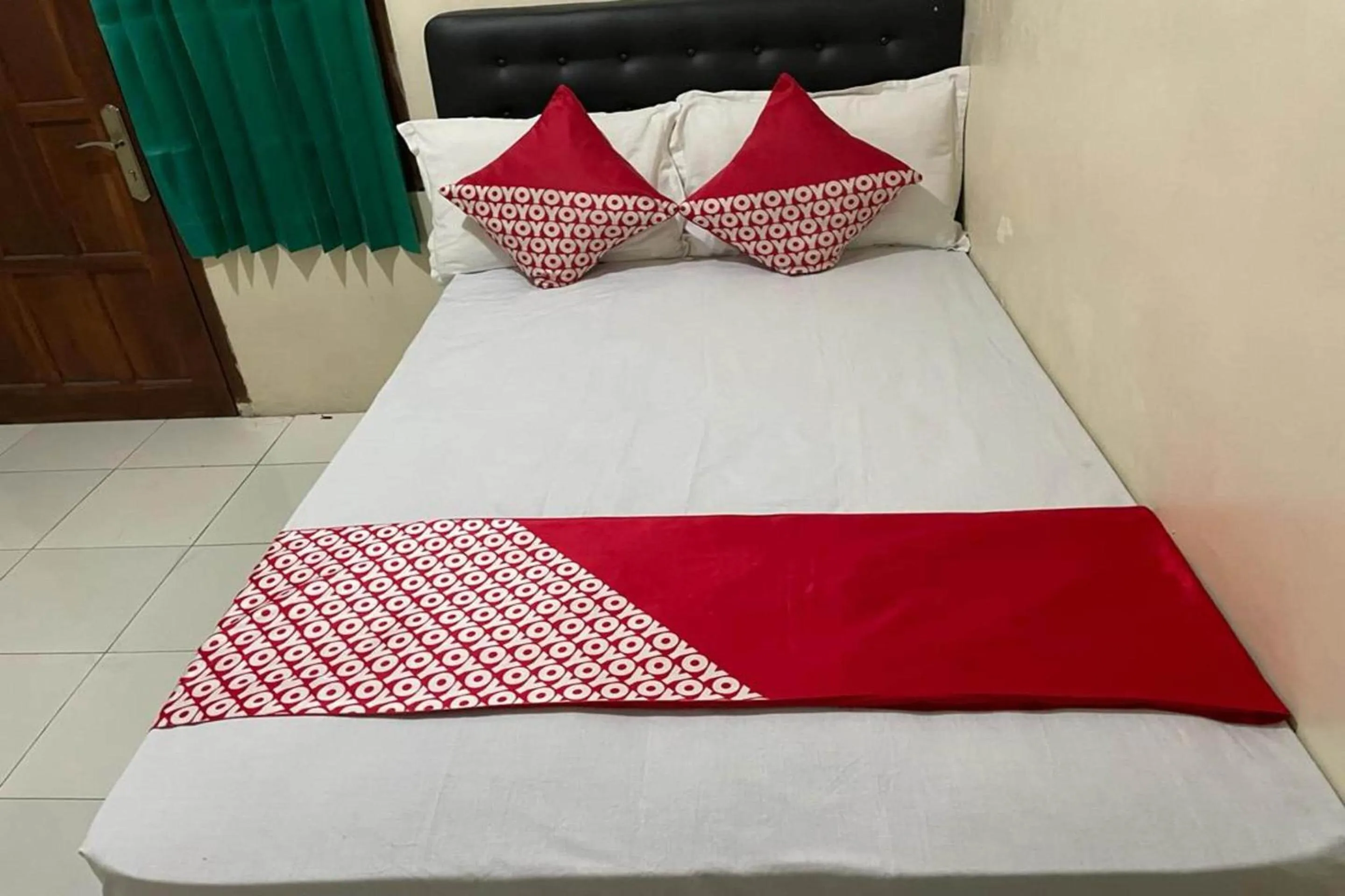 Bedroom in OYO 91920 Pondok'ku Inn