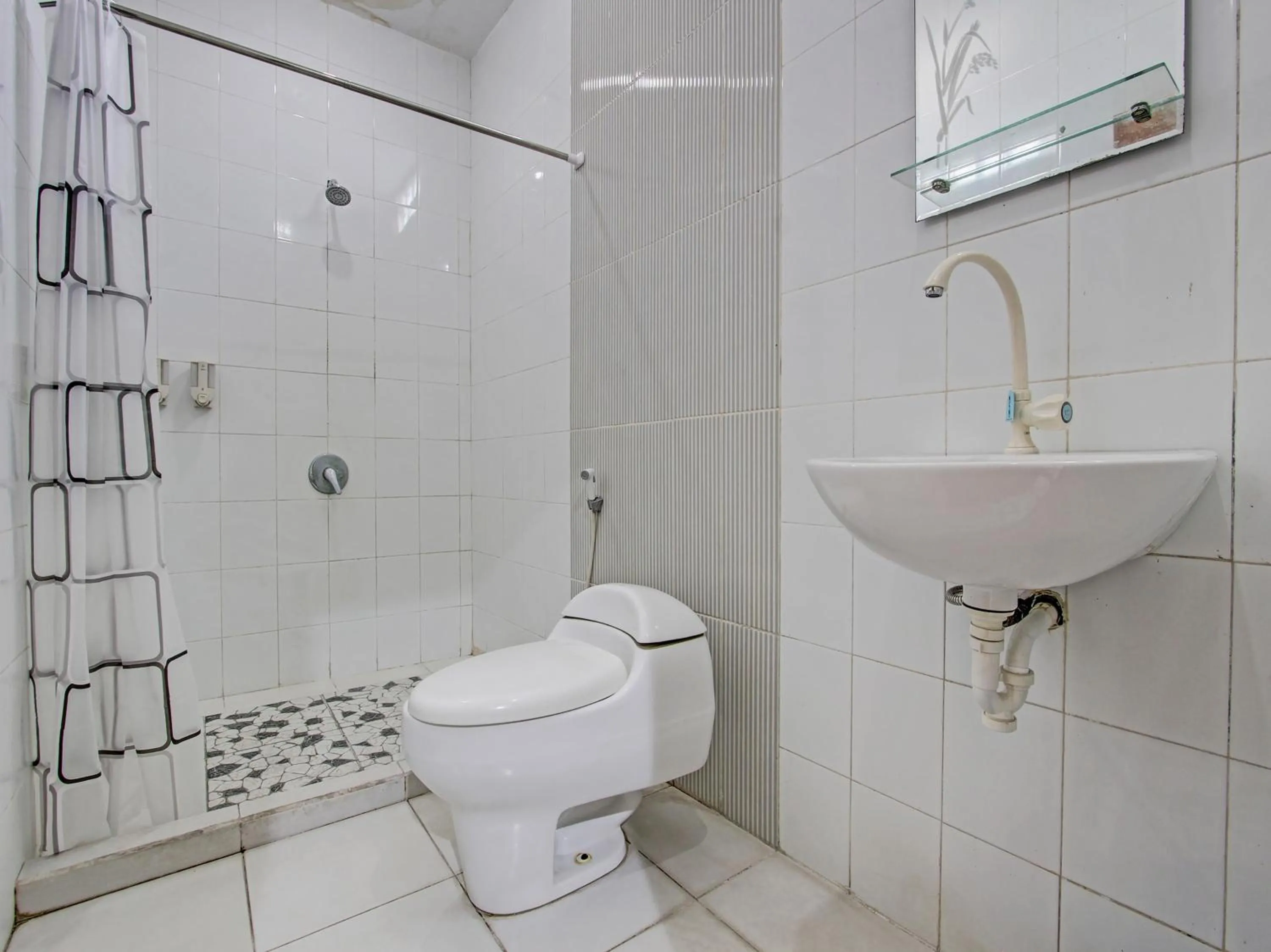 Bathroom in OYO 91920 Pondok'ku Inn