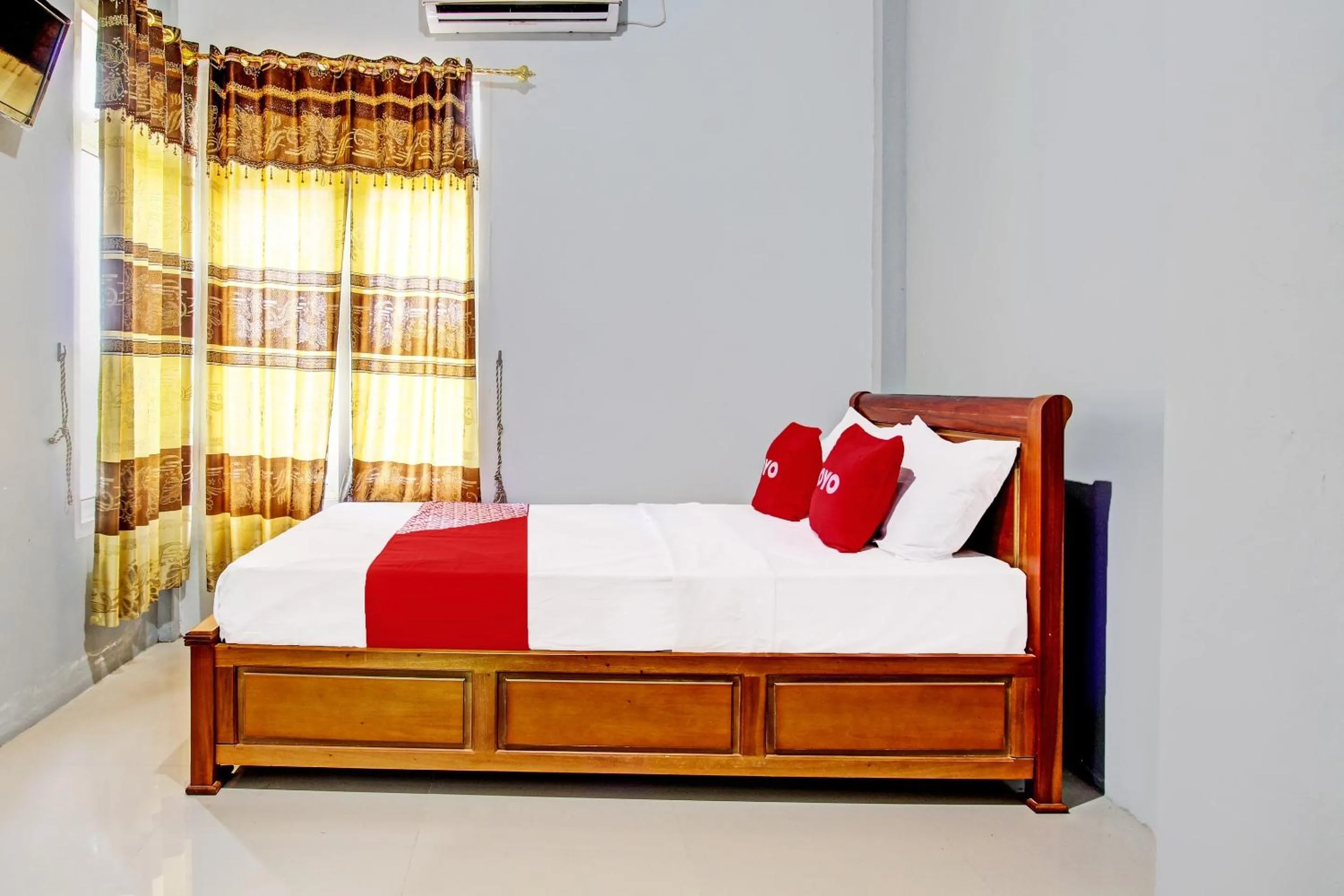 Bedroom in OYO 91960 Fariza House Syariah