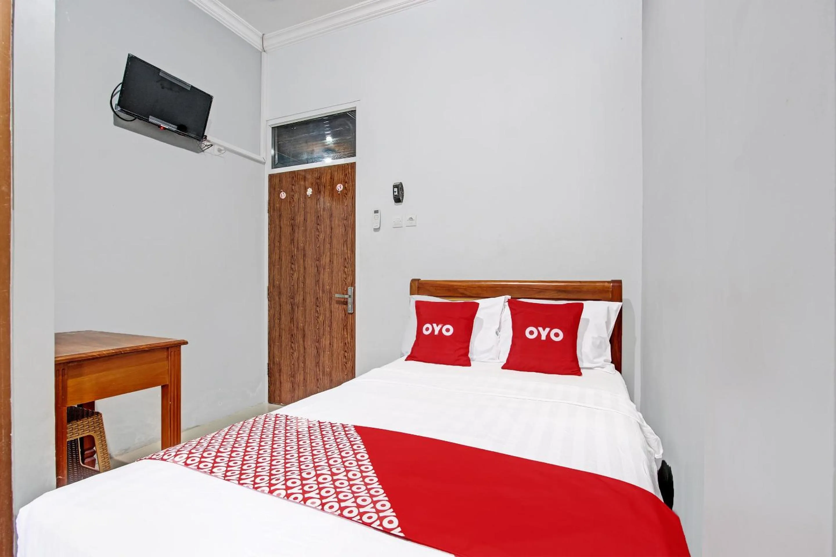 Bedroom in OYO 91960 Fariza House Syariah