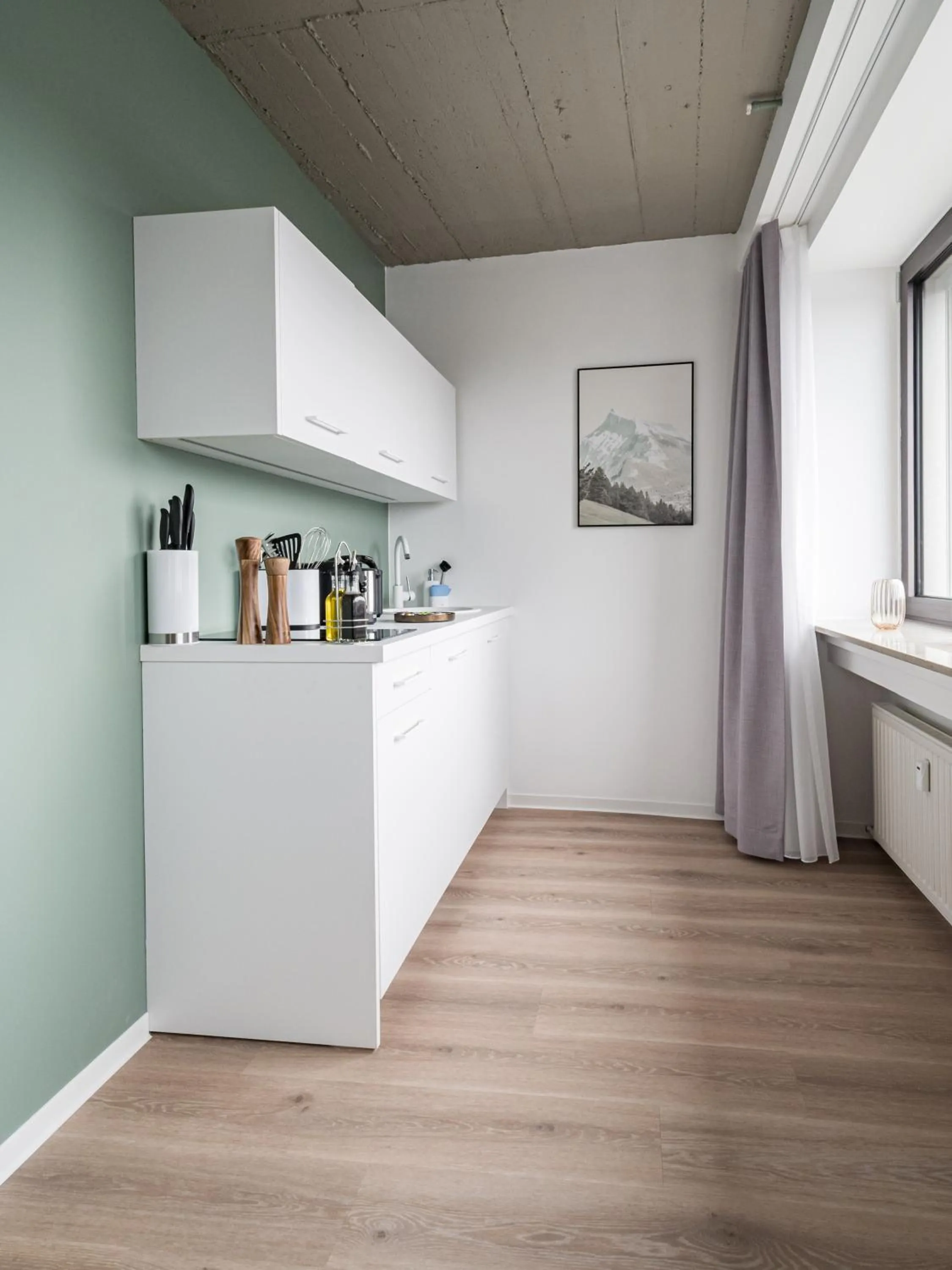 Kitchen or kitchenette in Limehome Saarbrücken Berliner Promenade