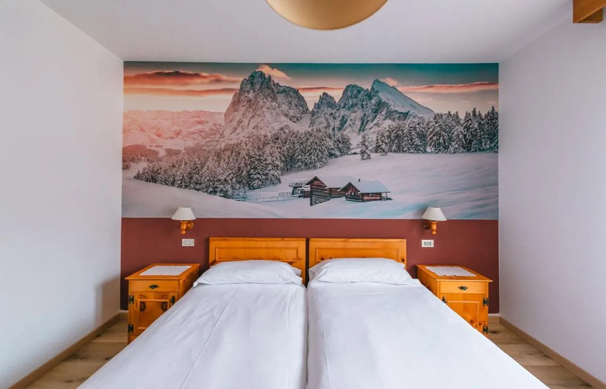 Bed in Hotel Garnì Rosengarten