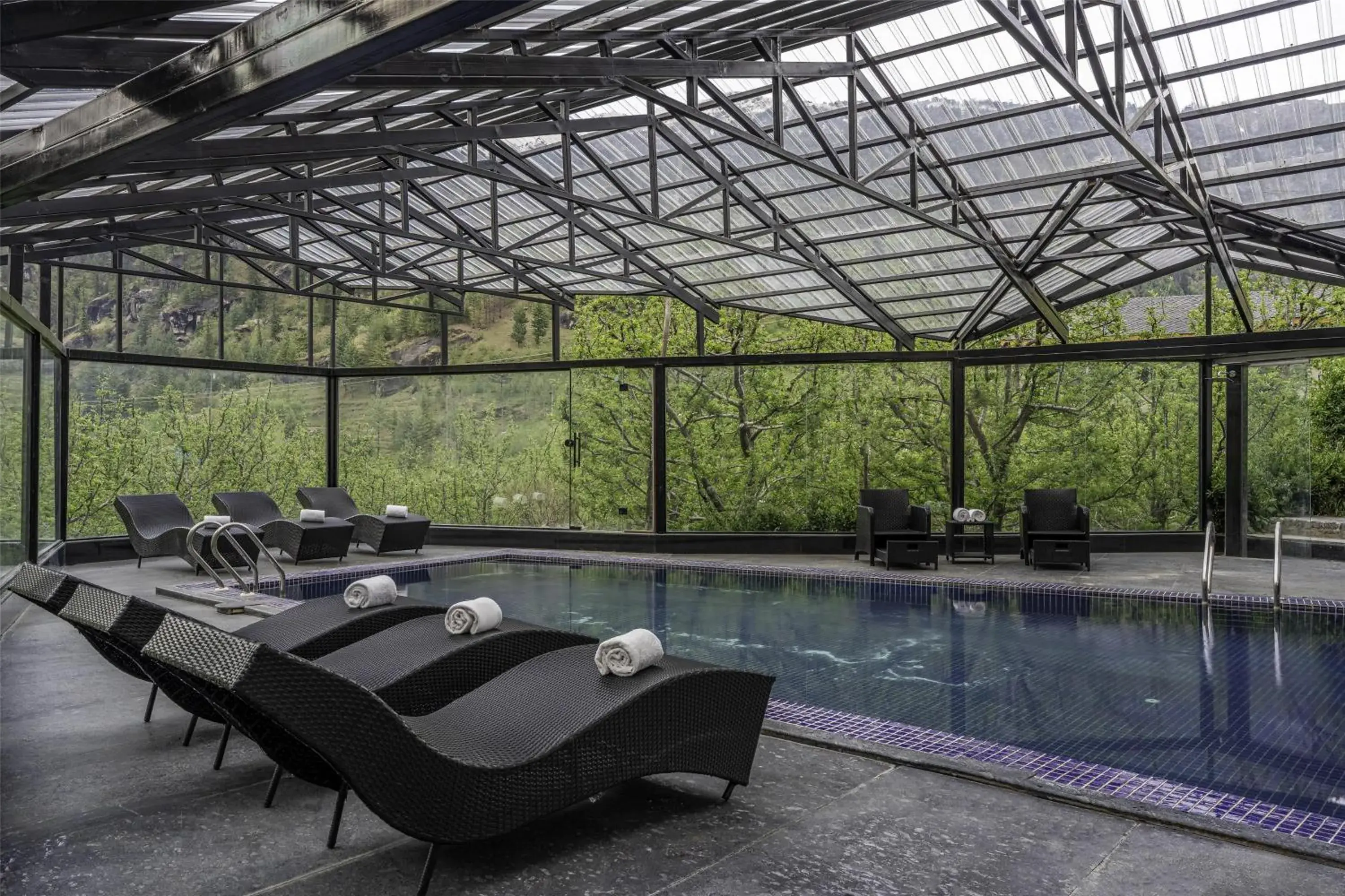 Pool view in Palchan Hotel & Spa - A member of Radisson Individuals Retreats Pool view in Palchan Hotel & Spa - A member of Radisson Individuals Retreats