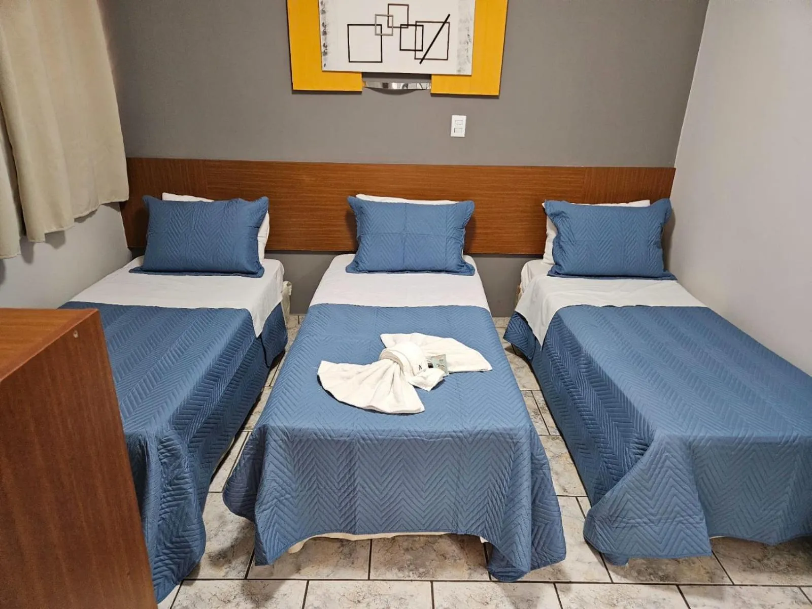 Bed in Alliance Hotel