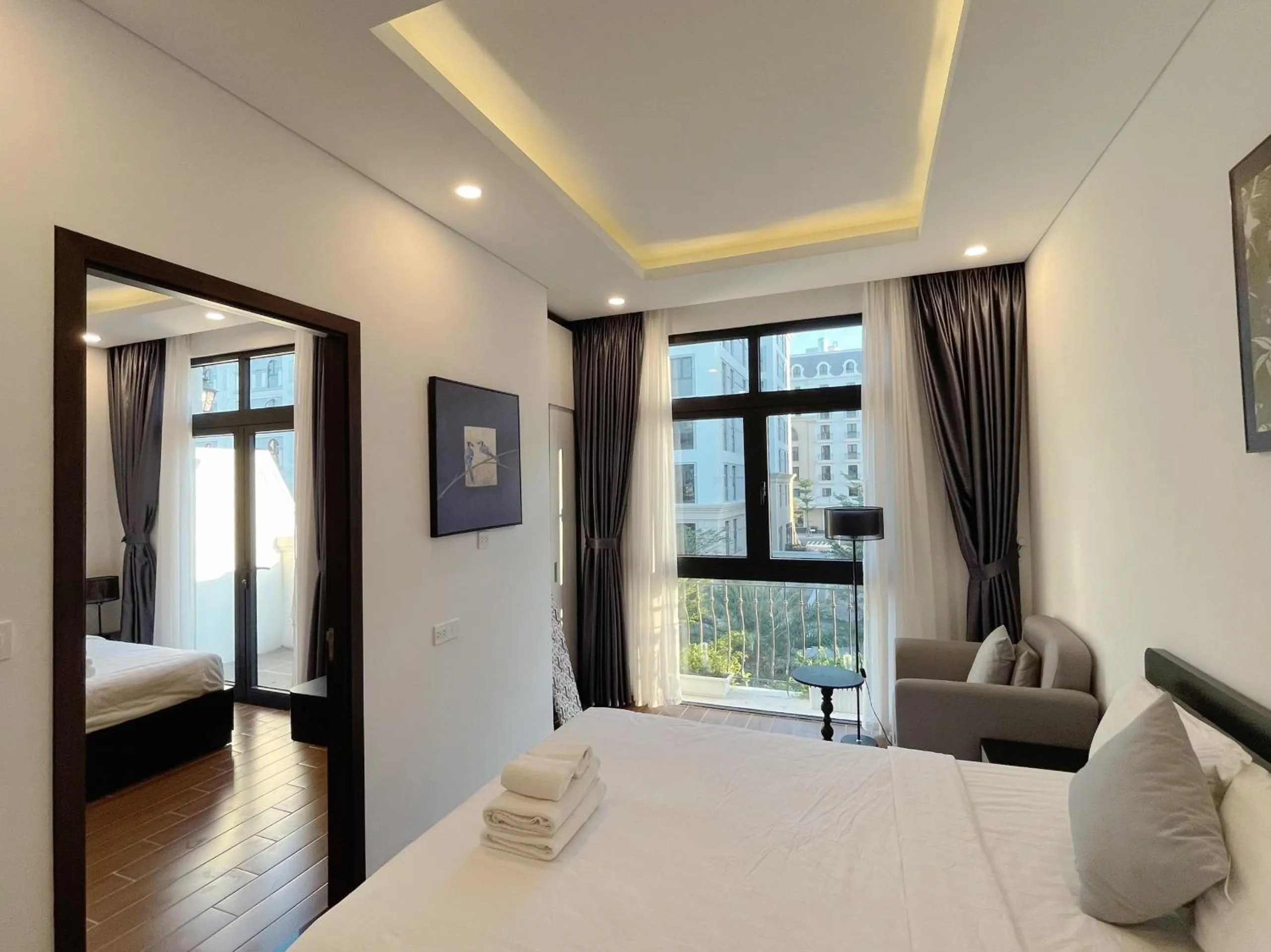 Photo of the whole room, Bed in Le Palmier Phu Quoc Hotel - Free Shuttle To Grand World