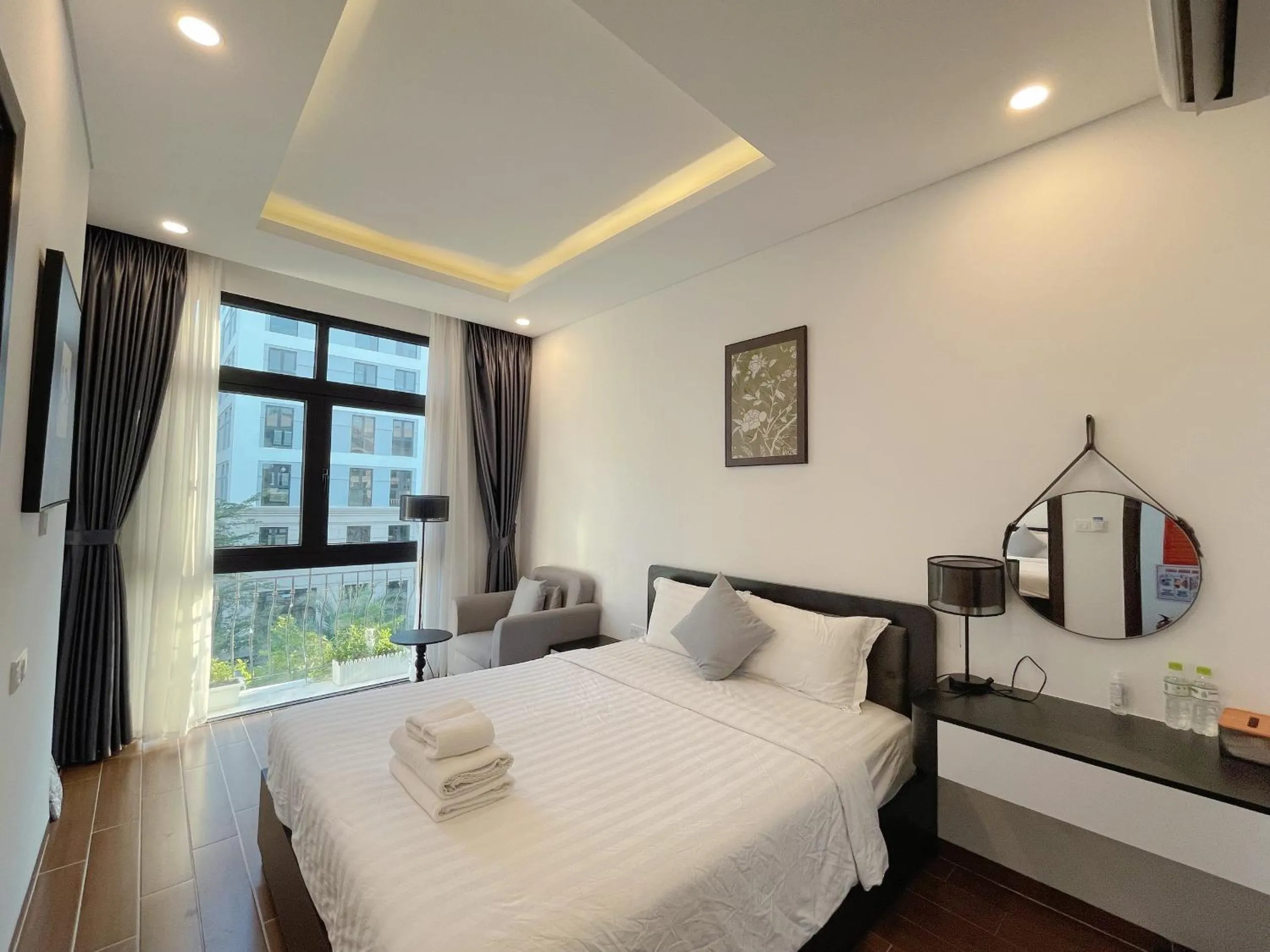 Photo of the whole room, Bed in Le Palmier Phu Quoc Hotel - Free Shuttle To Grand World