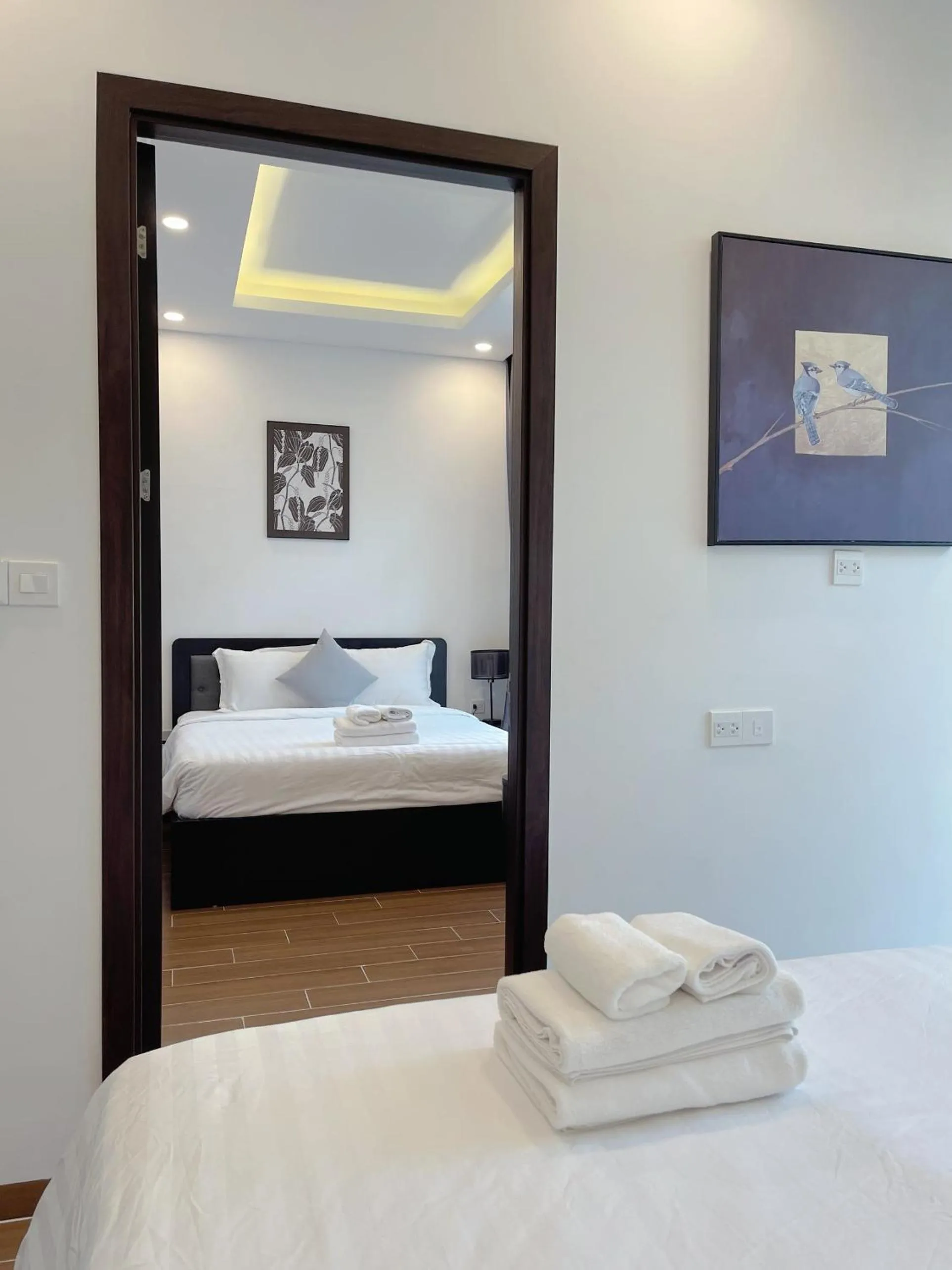 Photo of the whole room, Bed in Le Palmier Phu Quoc Hotel - Free Shuttle To Grand World