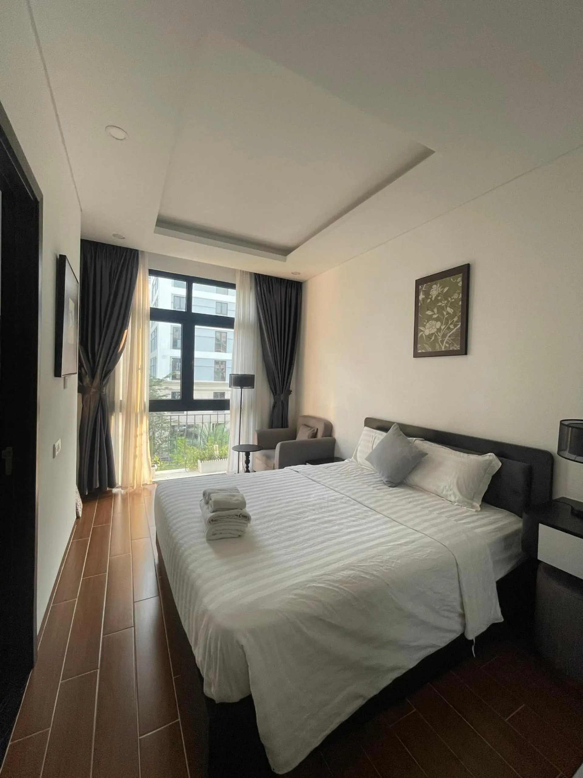 Photo of the whole room, Bed in Le Palmier Phu Quoc Hotel - Free Shuttle To Grand World