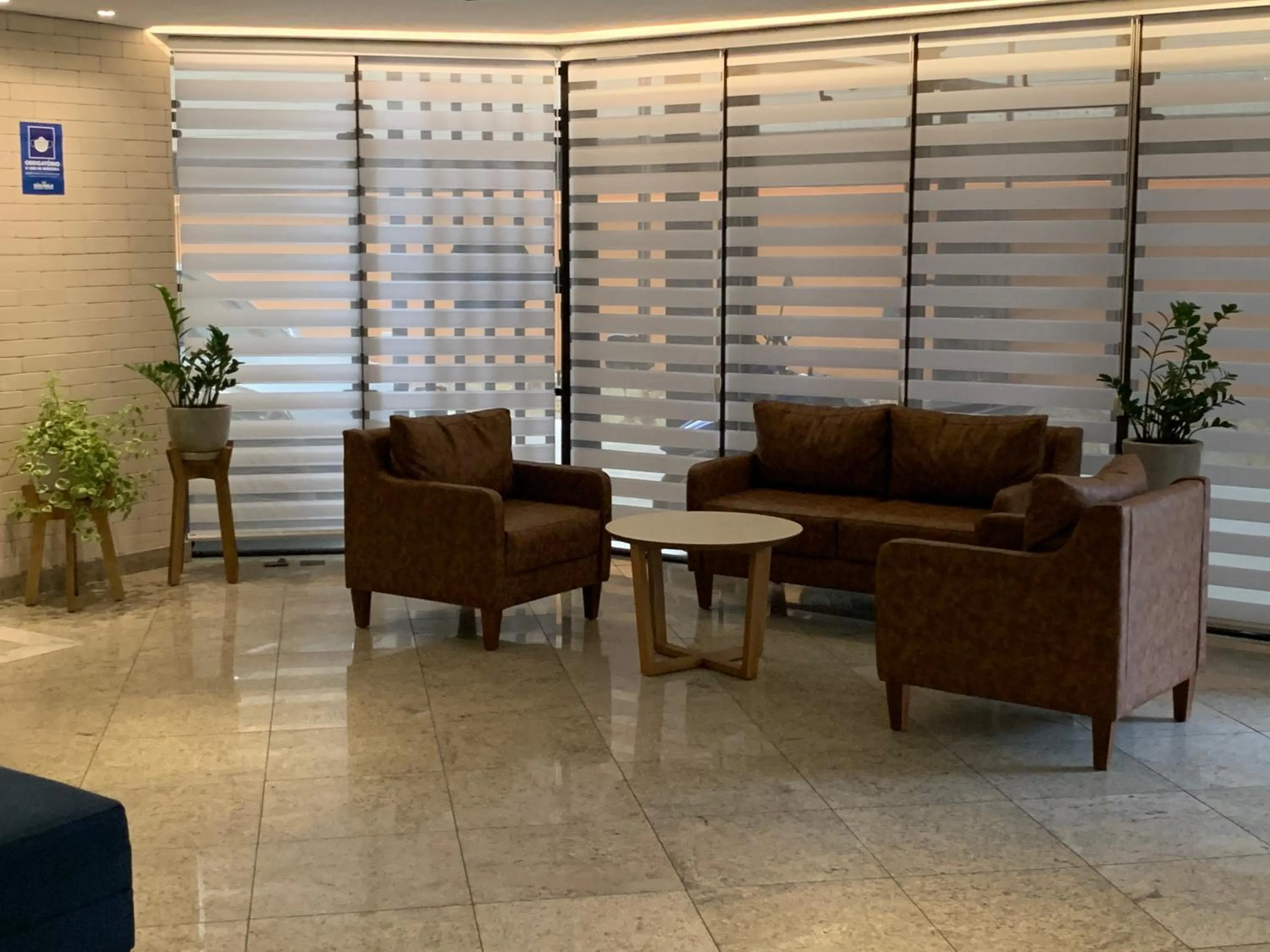 Communal lounge/ TV room in Cosmopolitan Praia Flat