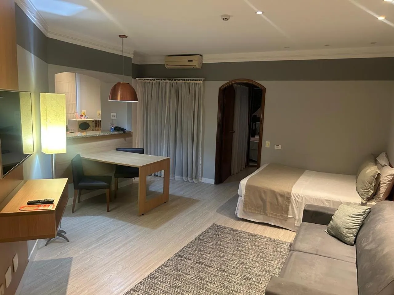 Living room, Bed in Cosmopolitan Praia Flat