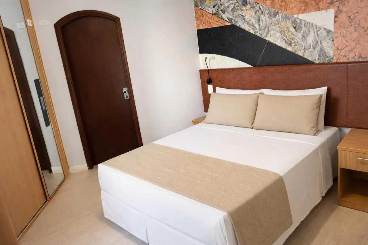 Photo of the whole room, Bed in Cosmopolitan Praia Flat Photo of the whole room, Bed in Cosmopolitan Praia Flat