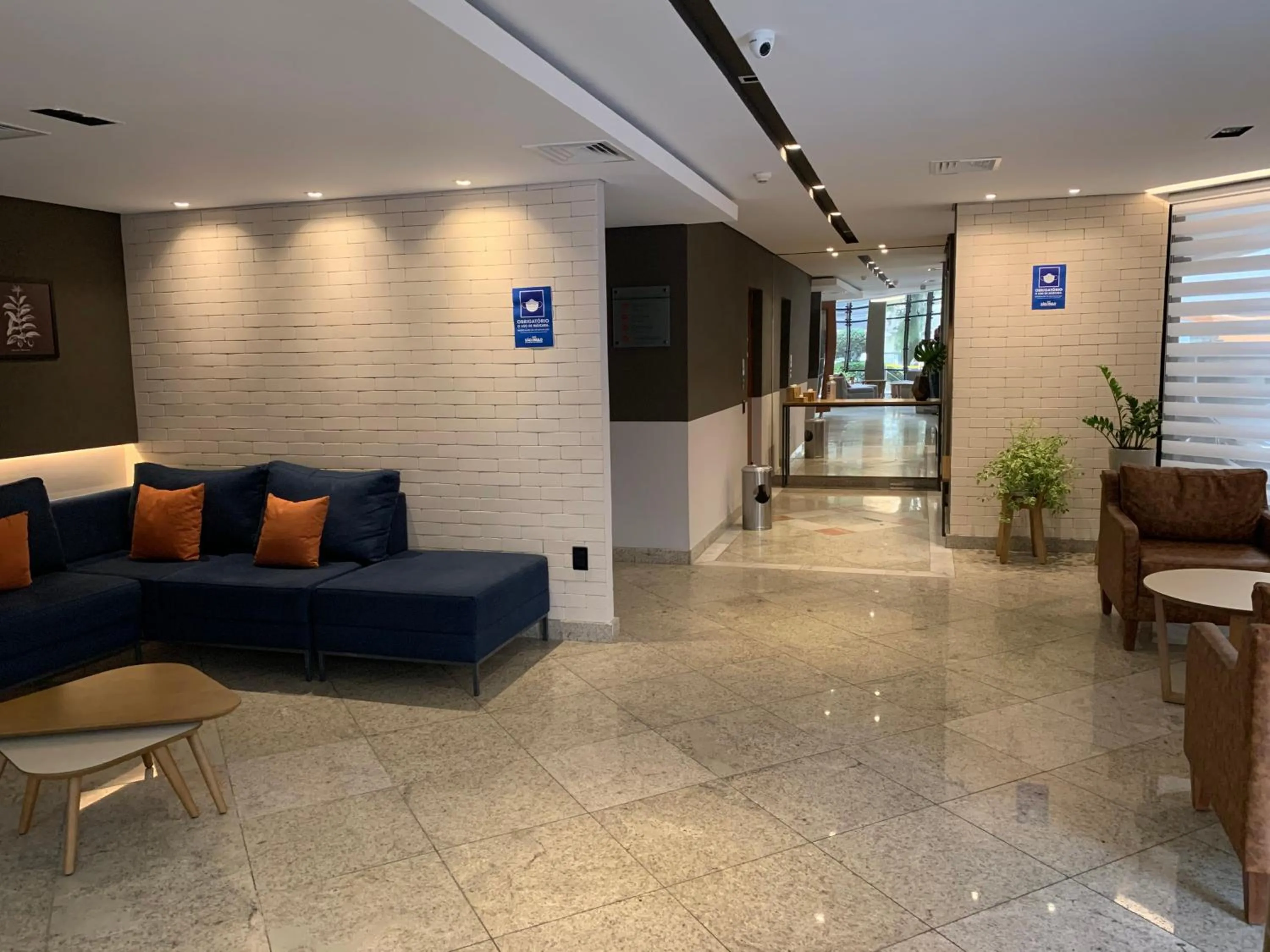 Communal lounge/ TV room in Cosmopolitan Praia Flat