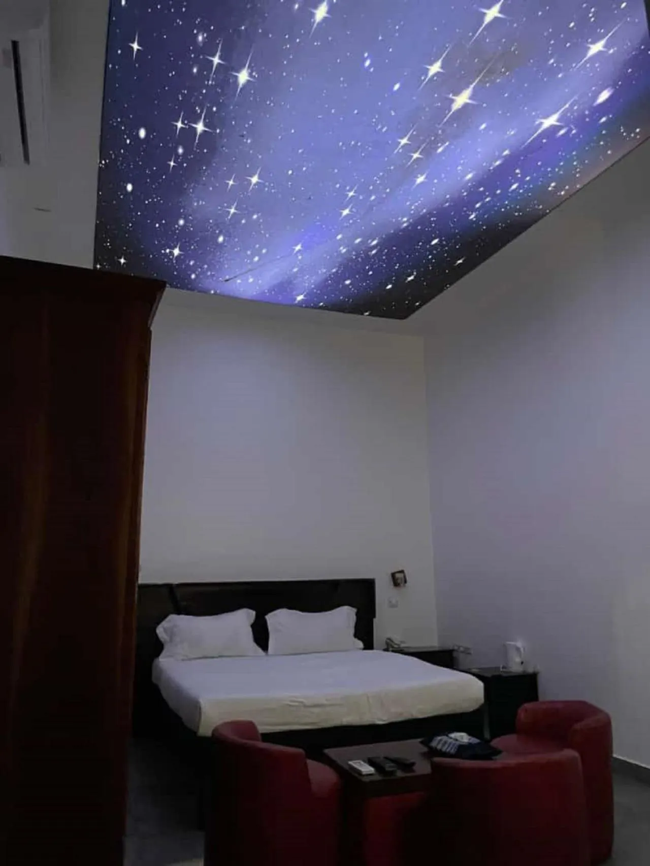 Bed in Hôtel Guest House Quatre Saisons