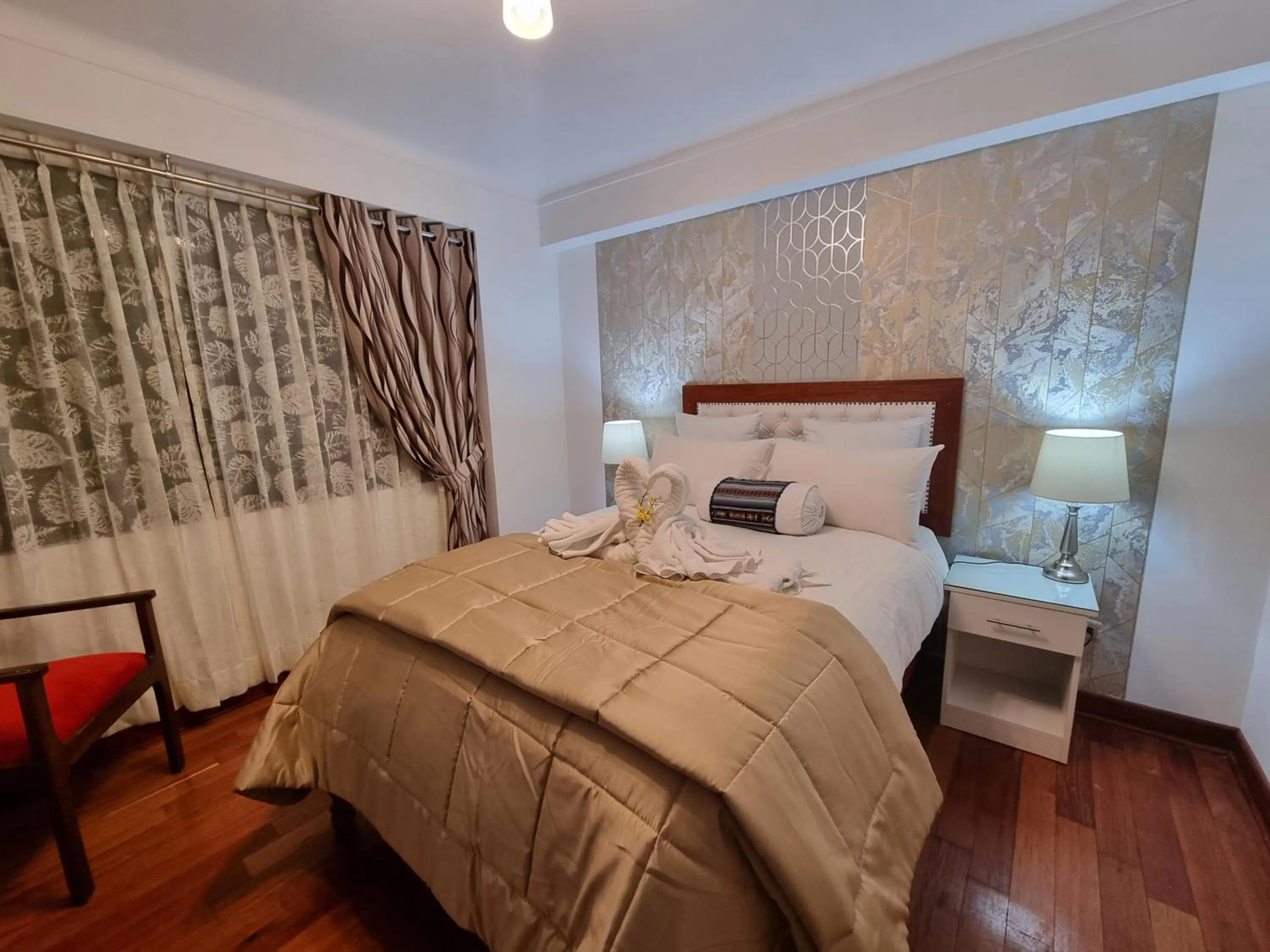 Bed in Hotel-Apartment INKASABIOS