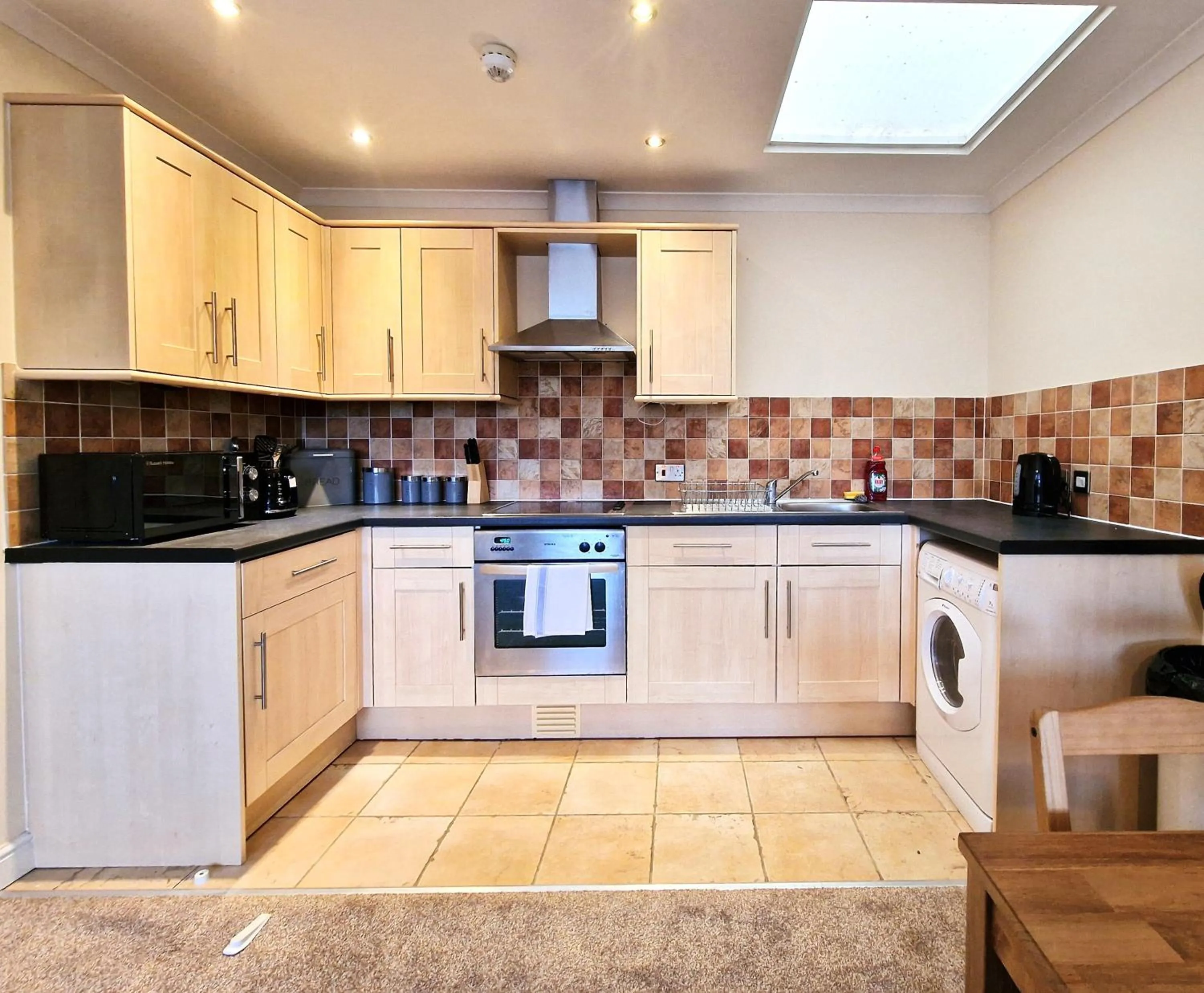 Kitchen or kitchenette in Old Town Apartments