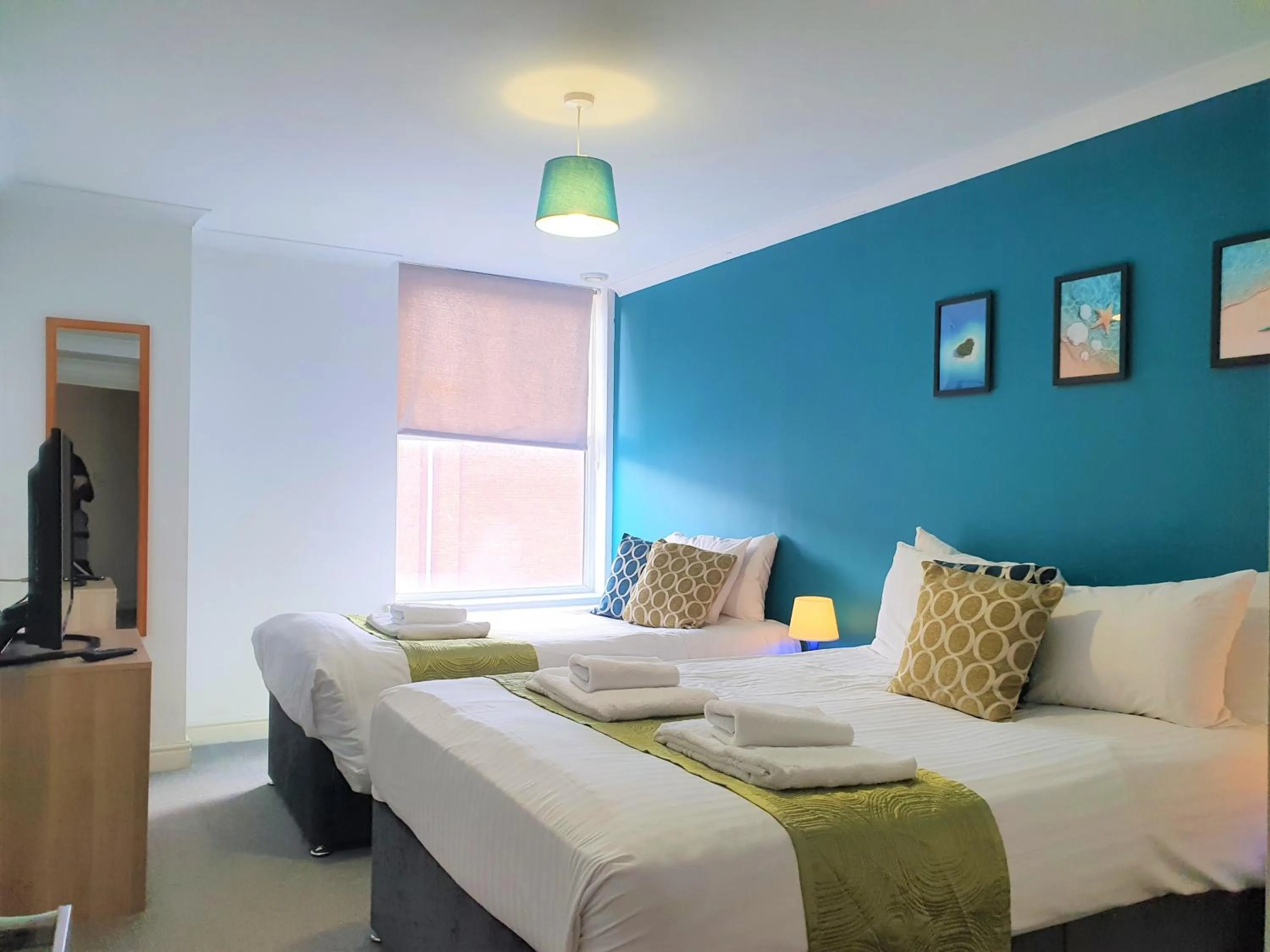 Bed in Old Town Apartments