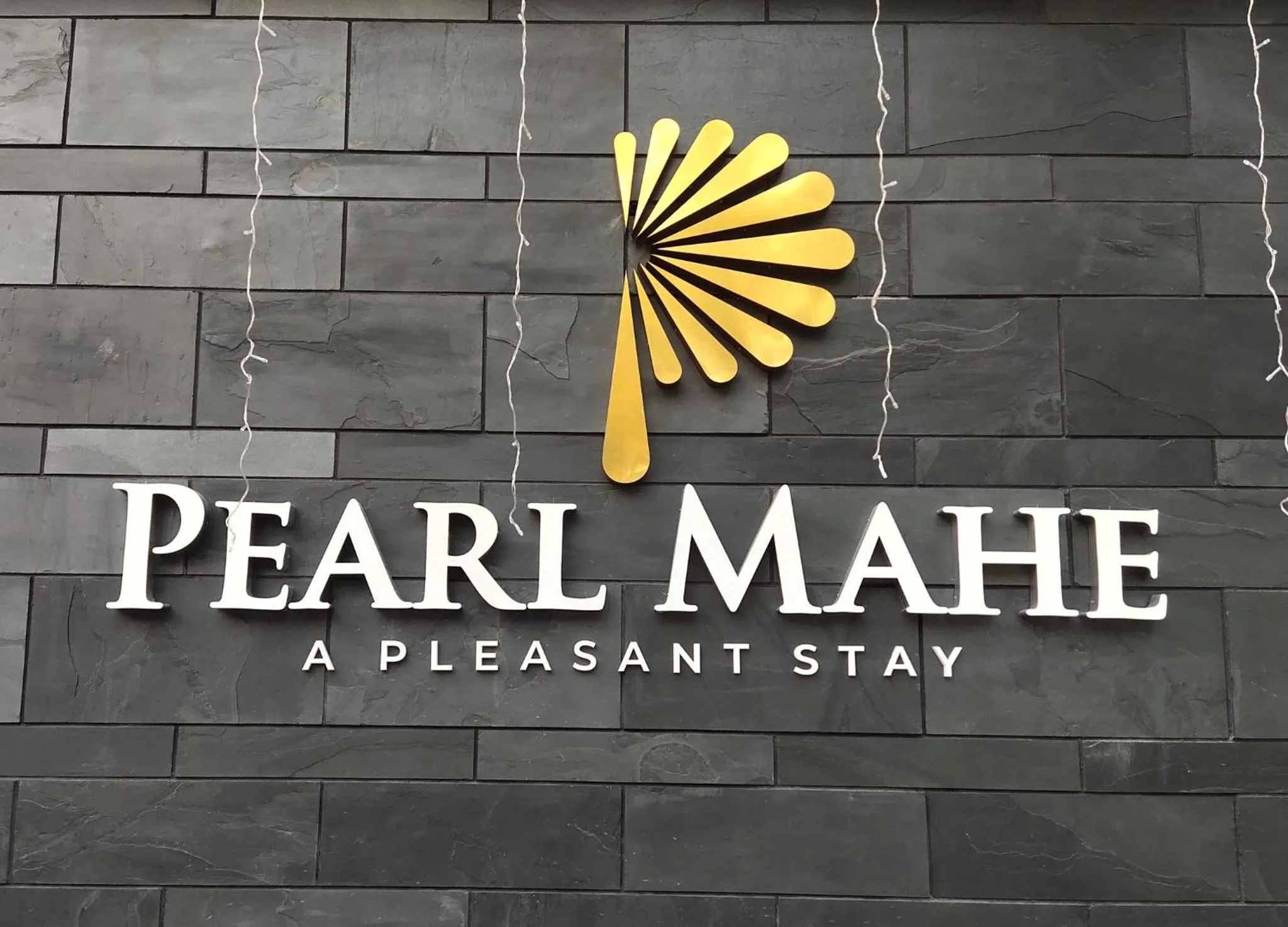 Property logo or sign in PEARL MAHE