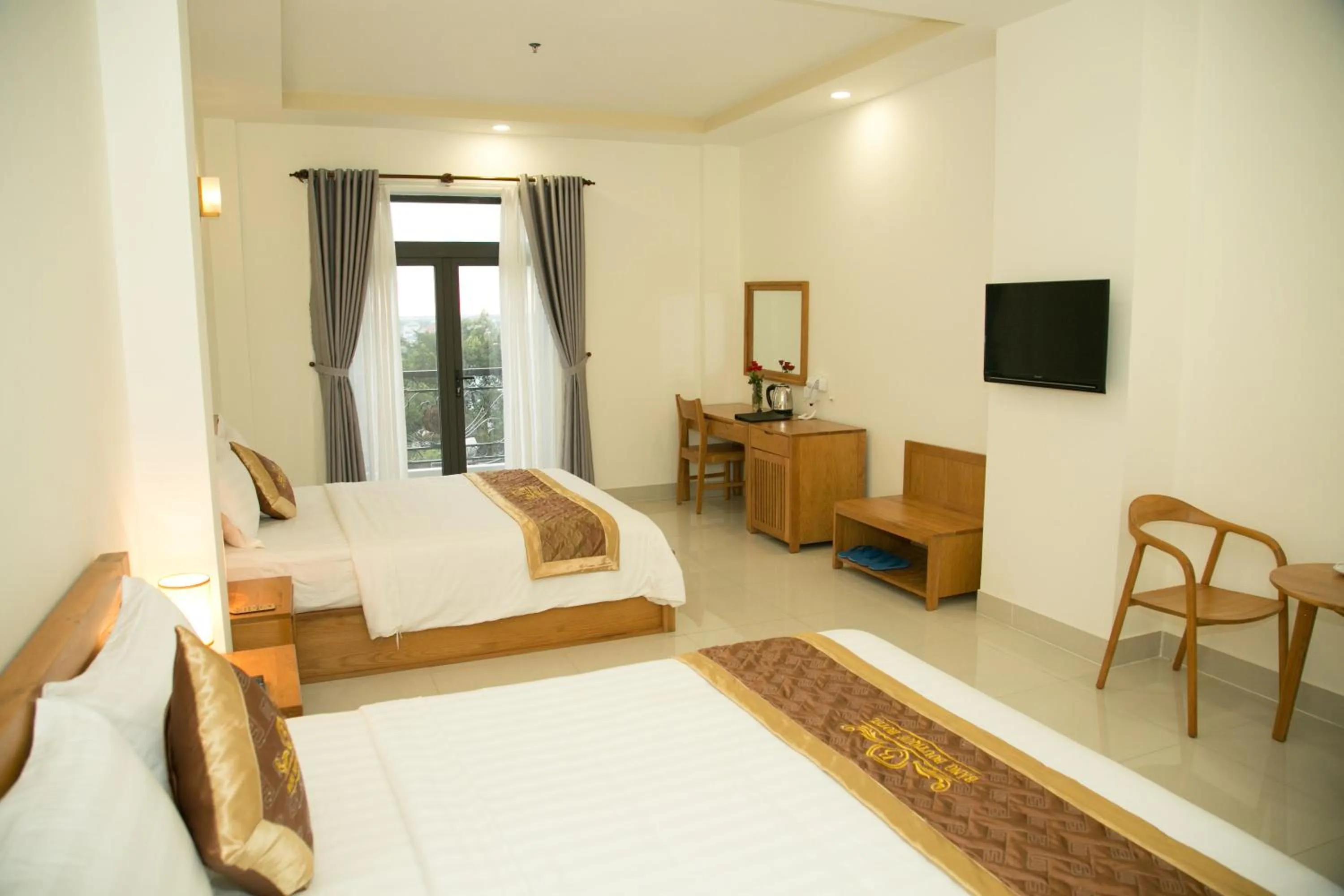 Communal lounge/ TV room, Bed in BĂNG BOUTIQUE HOTEL