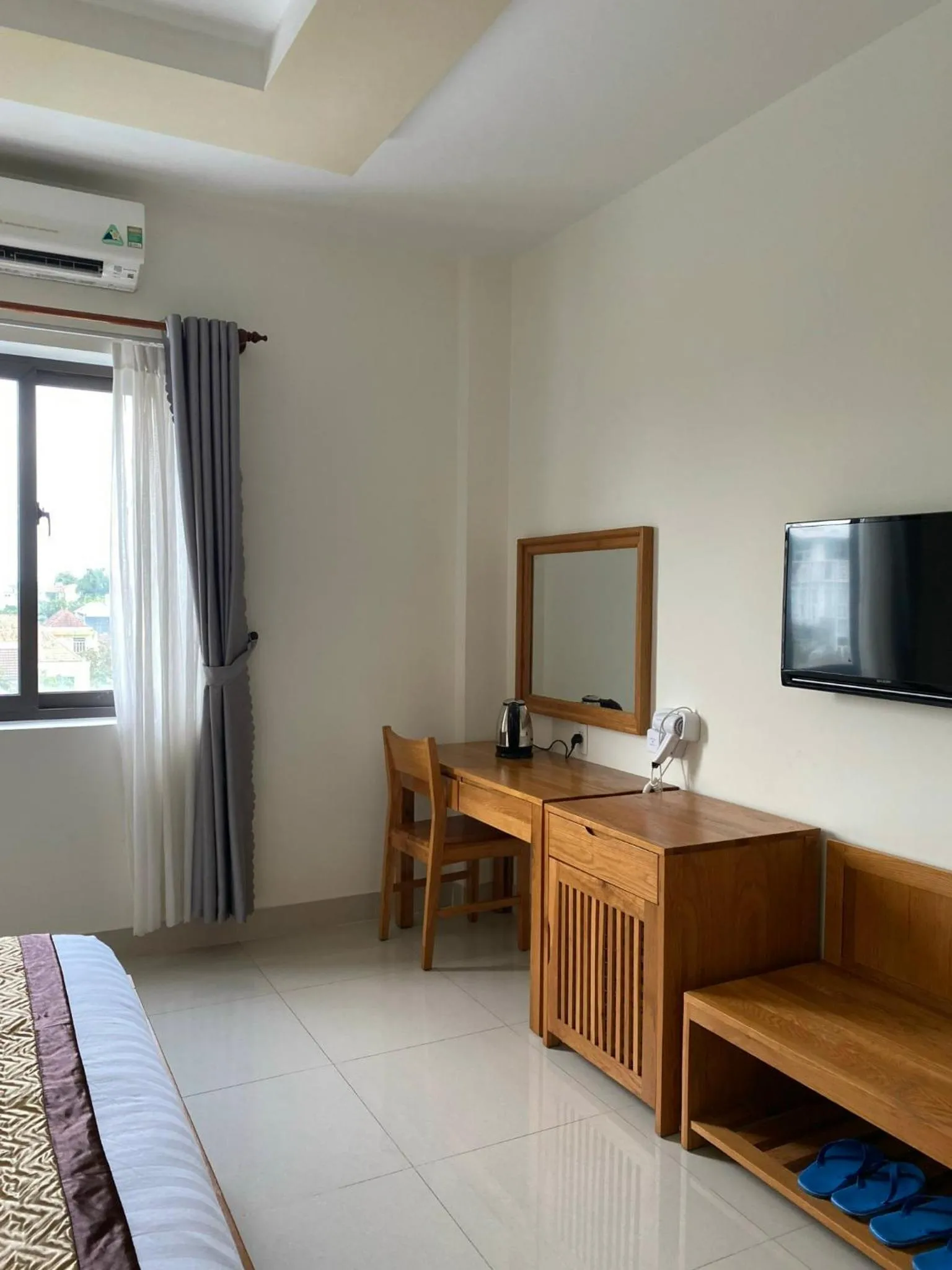 Communal lounge/ TV room in BĂNG BOUTIQUE HOTEL