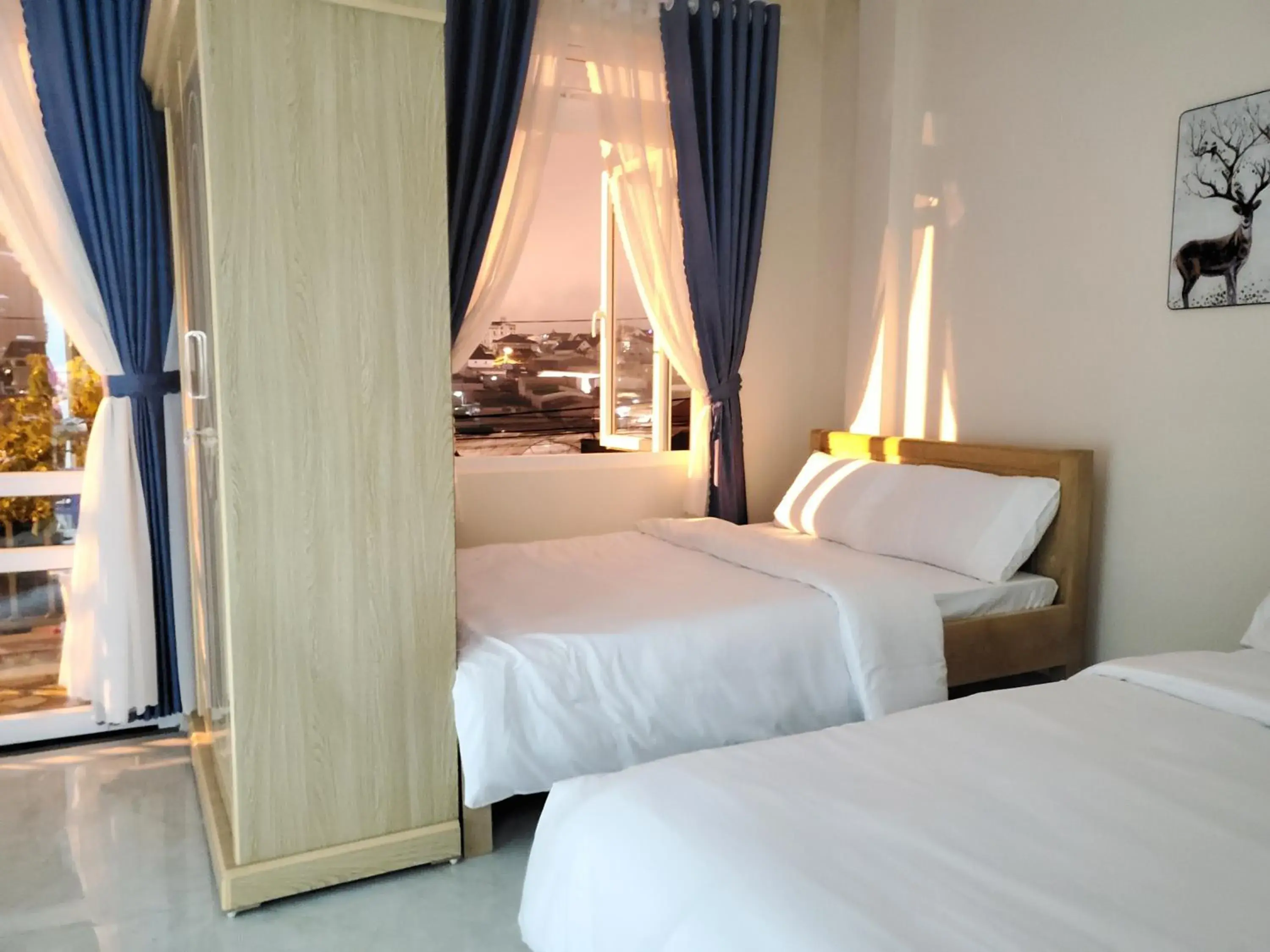 Deluxe Queen Room with Two Queen Beds in ECOTIME Villa Da Lat Deluxe Queen Room with Two Queen Beds in ECOTIME Villa Da Lat