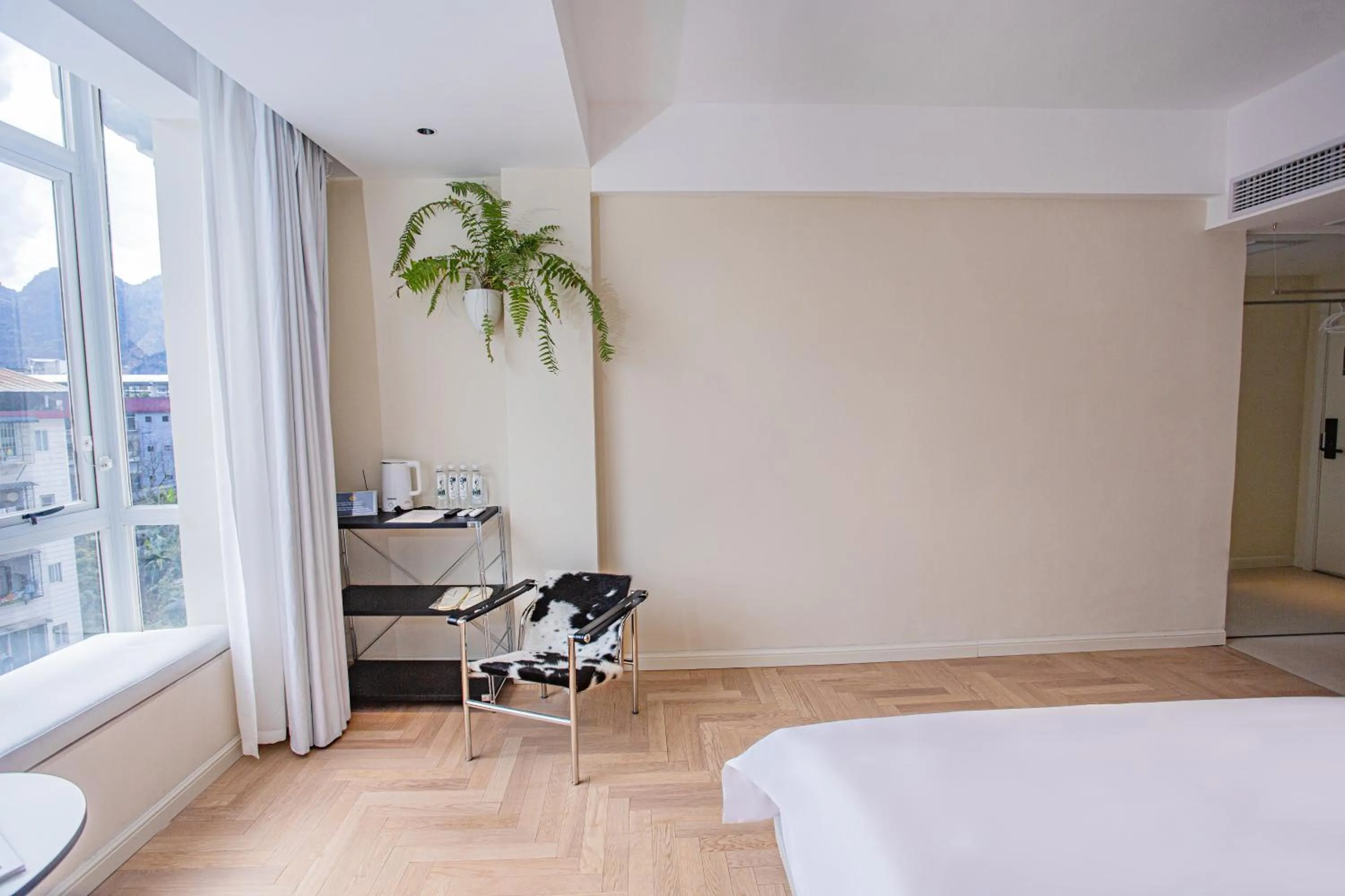 Bed in IM Waiting Hotel