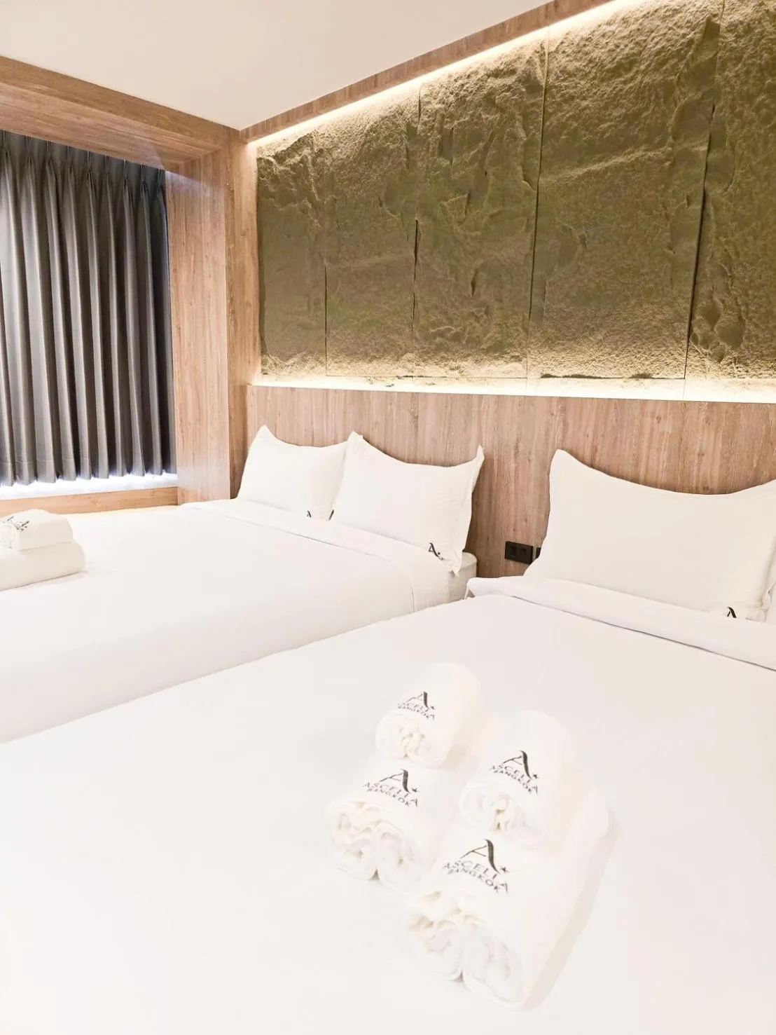 Bed in Ascella Bangkok Hotel