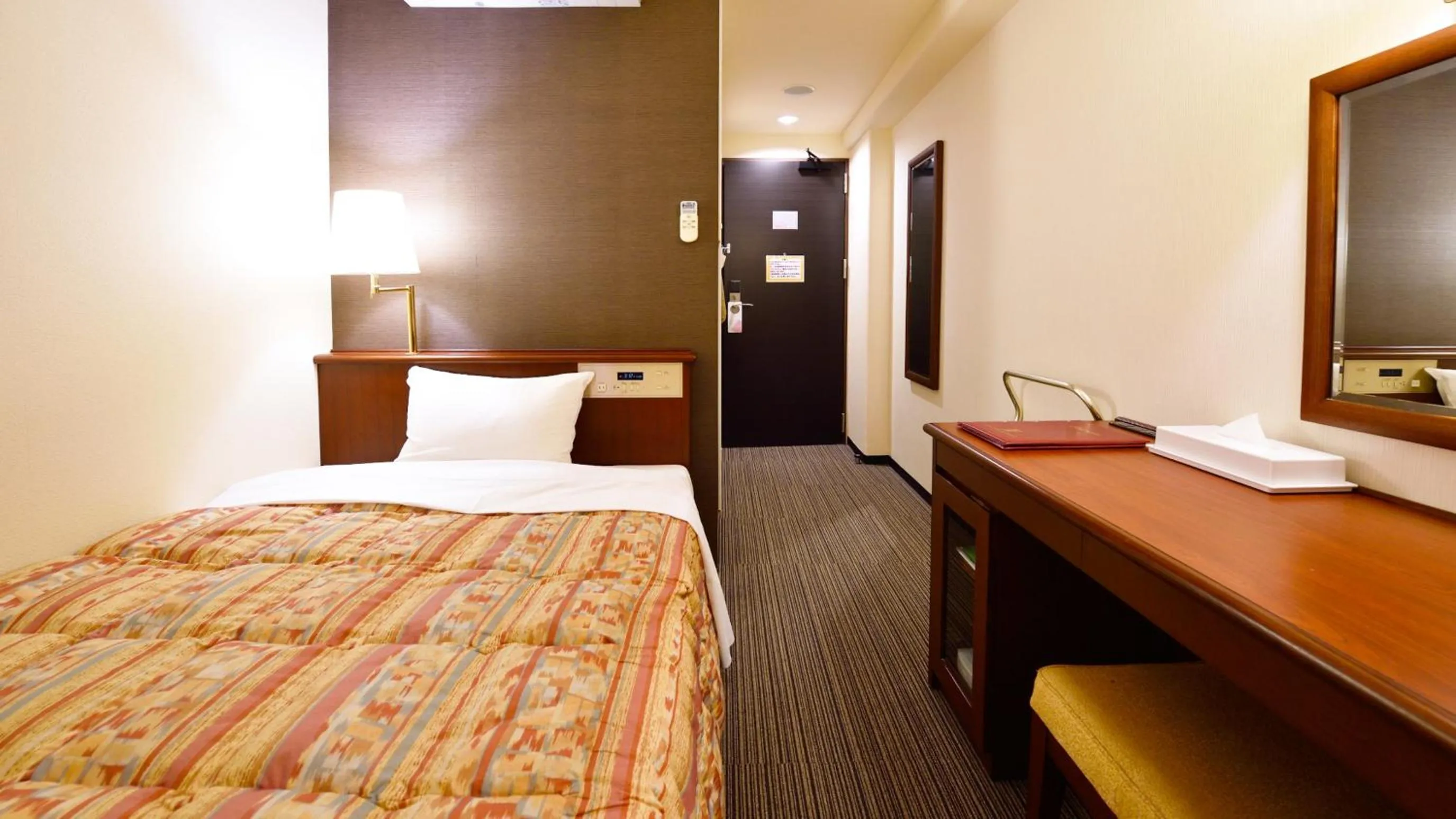 Bed in Hotel GRANDSPA AVENUE