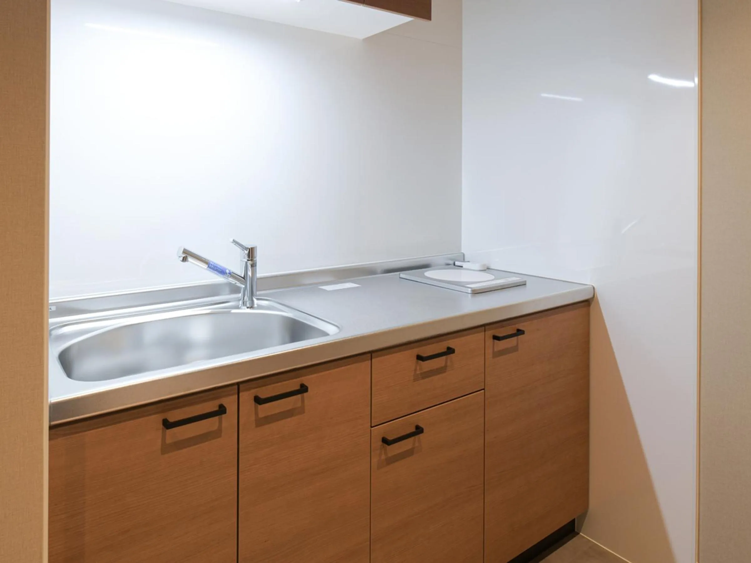 Kitchen or kitchenette in Vessel Inn Asakusa Tsukuba Express